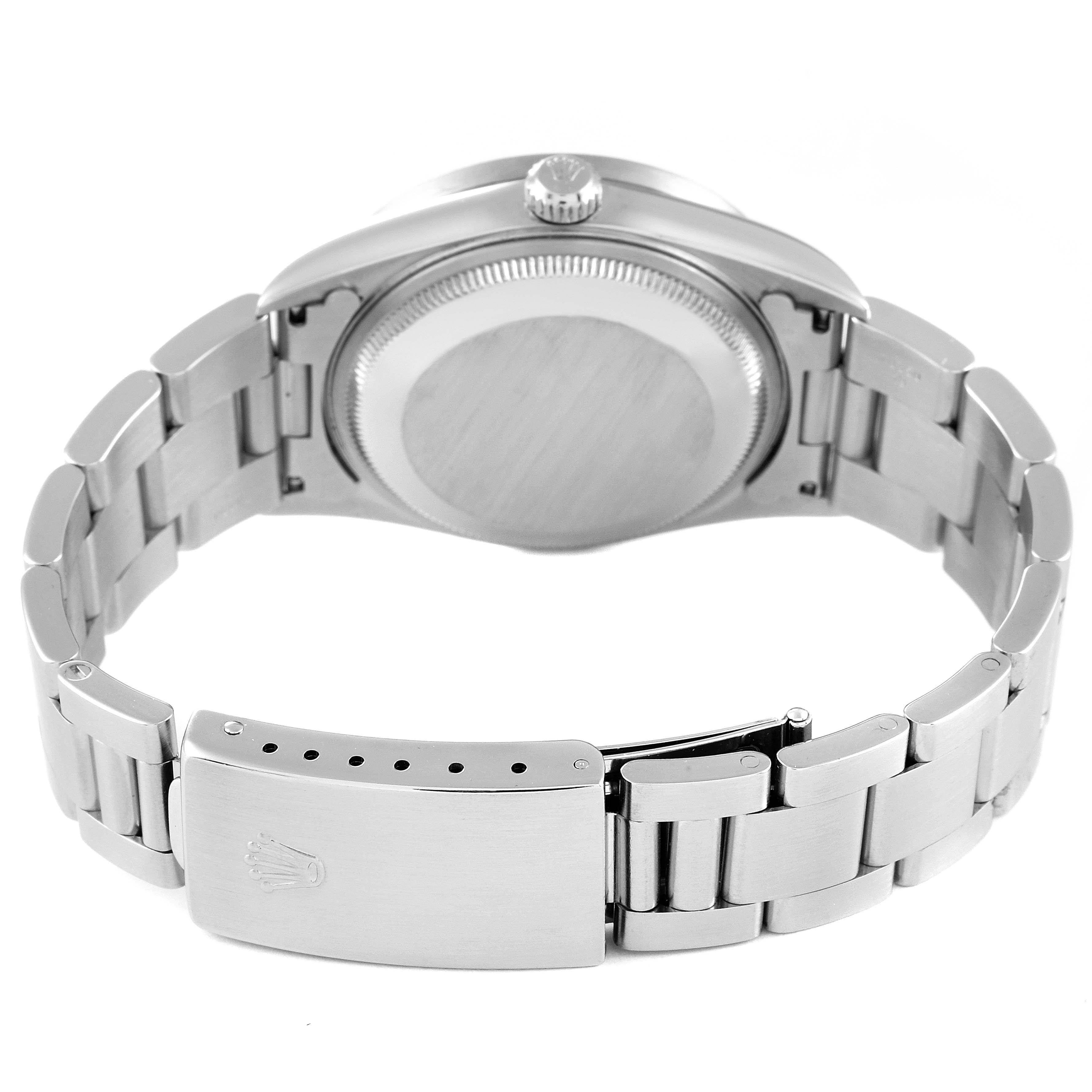 The image shows the back case and bracelet of a Rolex Date 15210 Men
s Stainless Steel Black Dial 15210 Men
s Stainless Steel Black Dial model watch from a rear view angle.