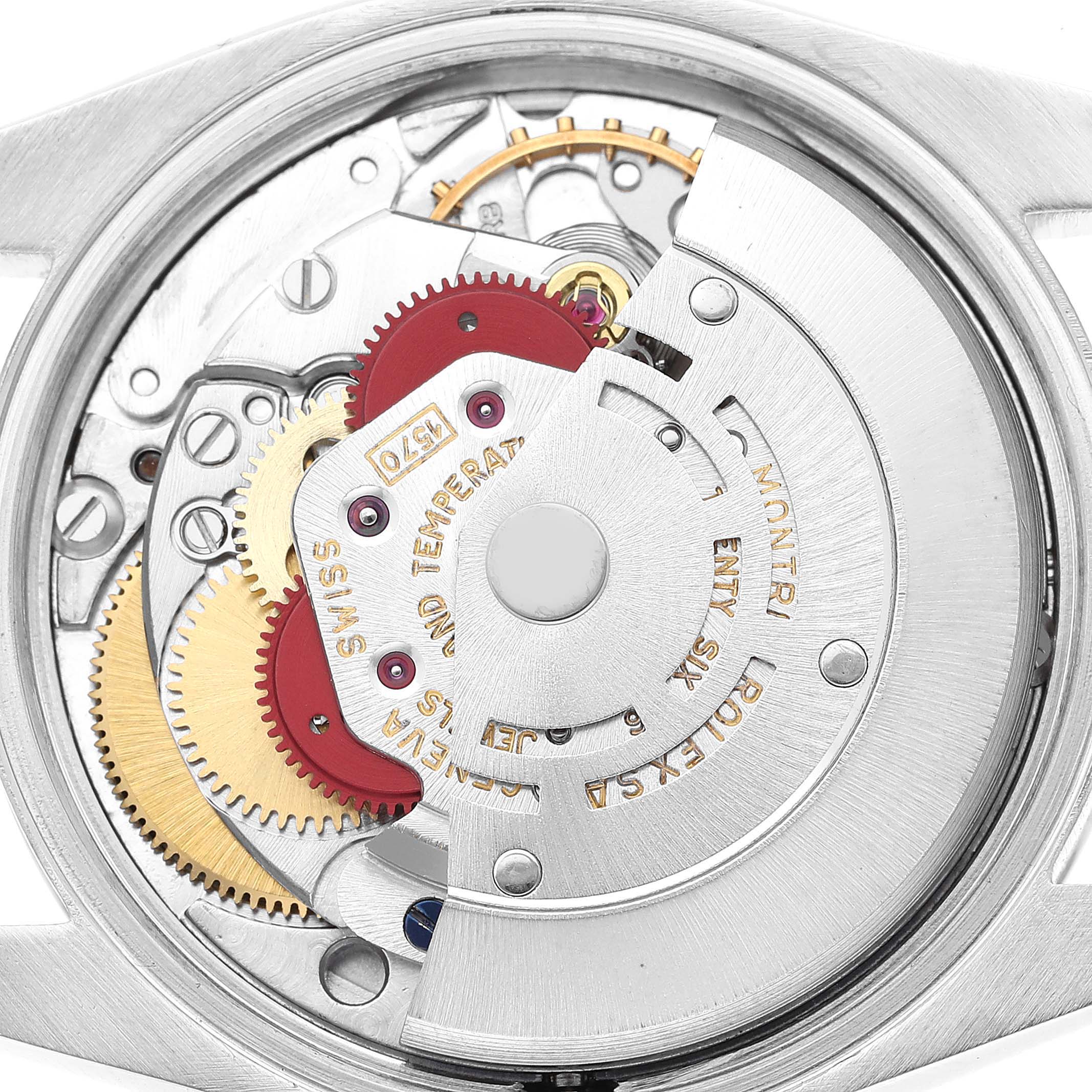 This is a close-up view of the Rolex Vintage Collection 1500 Men's Stainless Steel Silver Dial 1500 Men's Stainless Steel Silver Dial watch's internal movement mechanism.