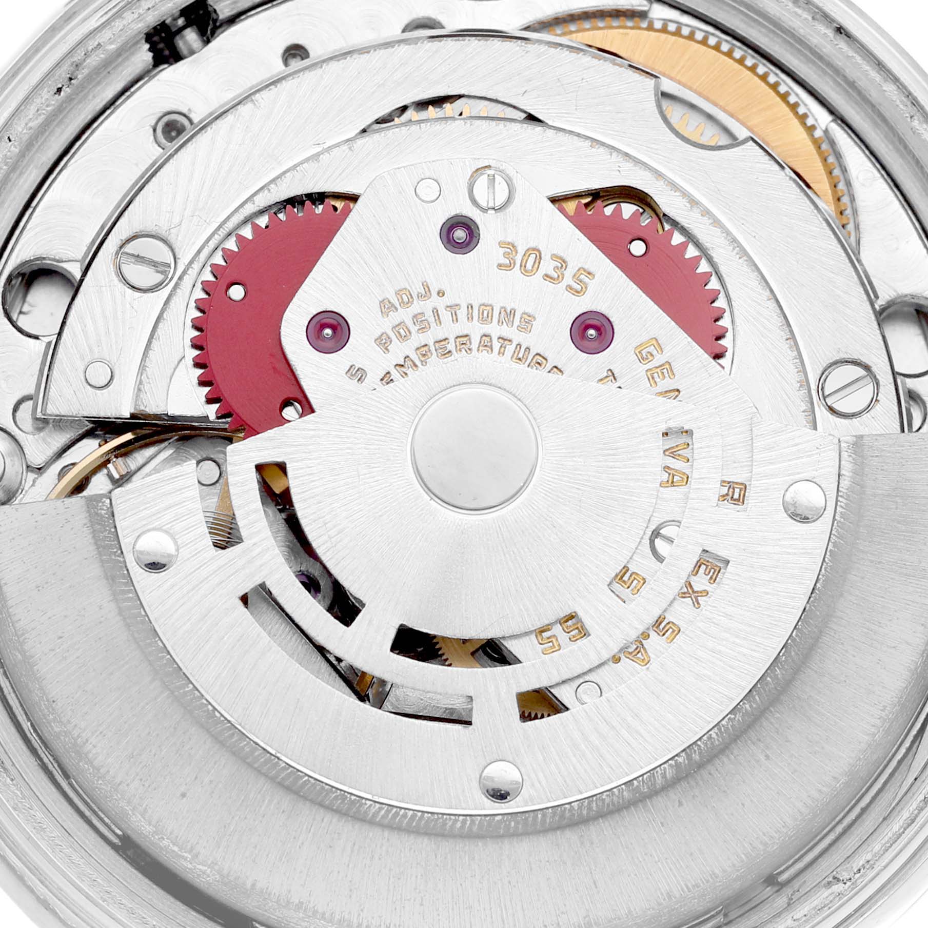 This image shows a close-up view of the intricate internal movement of a Vintage Collection model by Rolex.