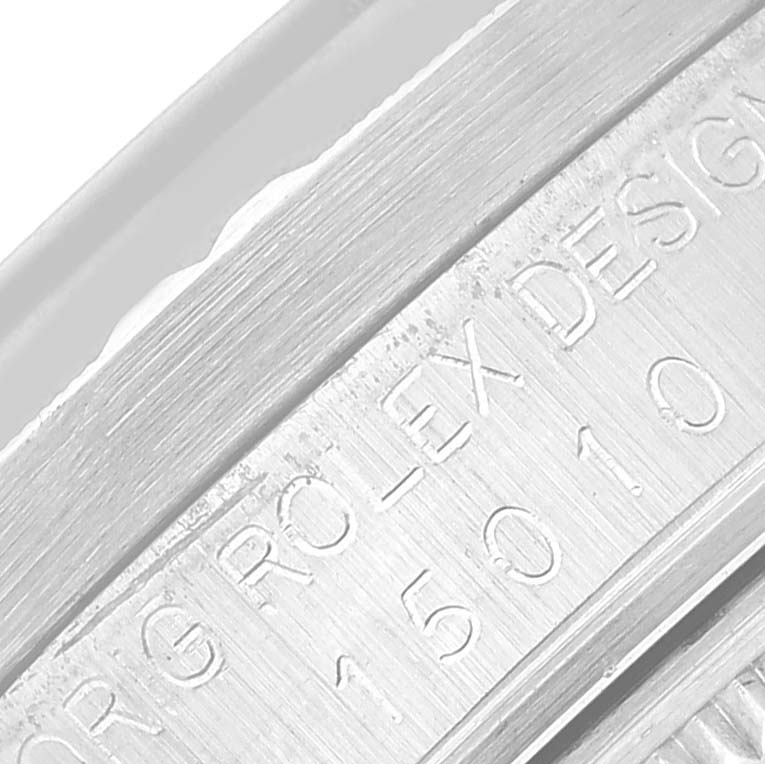 This image shows a close-up of the engraved casing, displaying the model and brand details of the Rolex Vintage Collection 15010 Men's Stainless Steel Silver Dial 15010 Men's Stainless Steel Silver Dial watch.