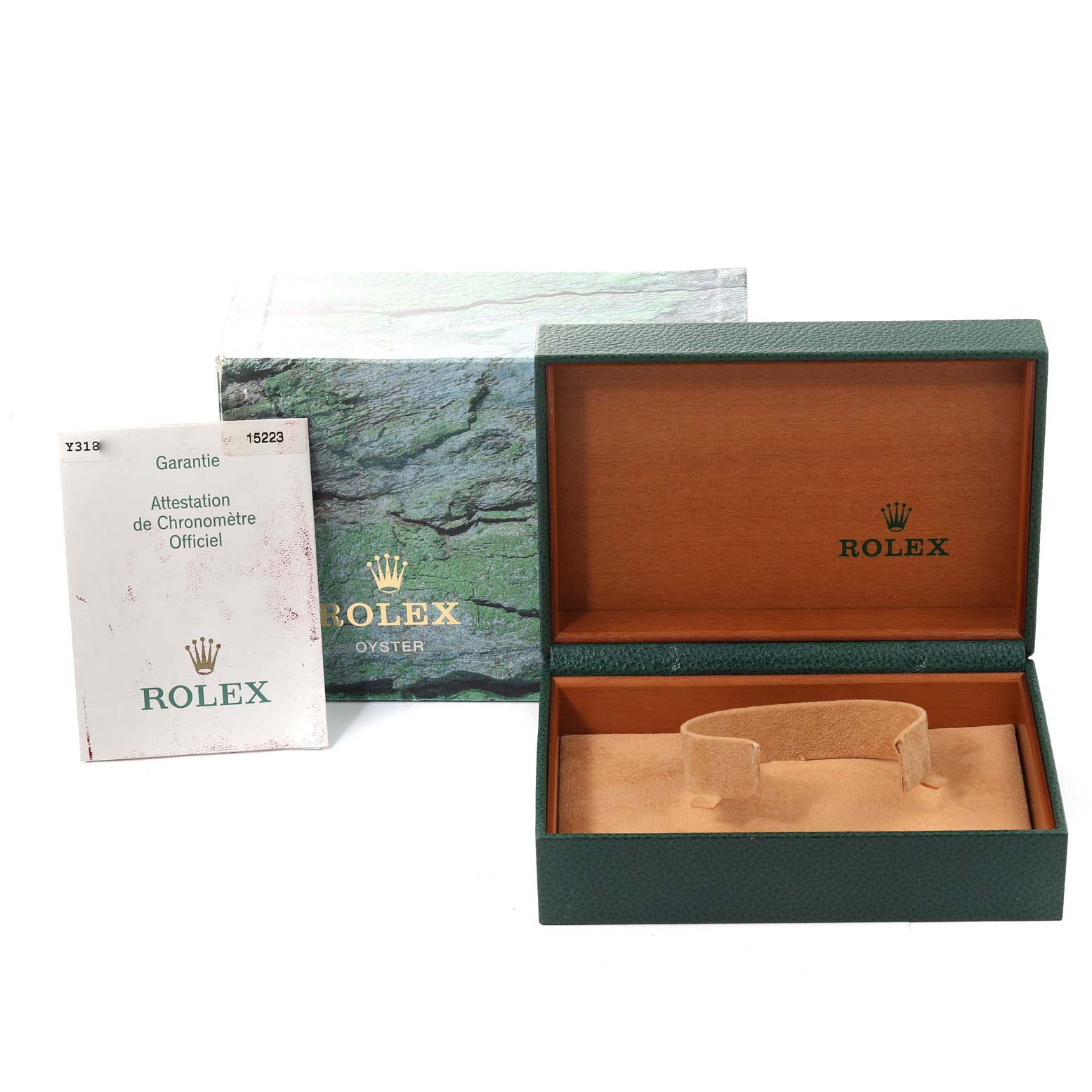 This image shows the packaging, including the box and warranty card, for a Rolex Date 15223 Men
s Steel and Gold (two tone) Blue Dial 15223 Men
s Steel and Gold (two tone) Blue Dial model watch.