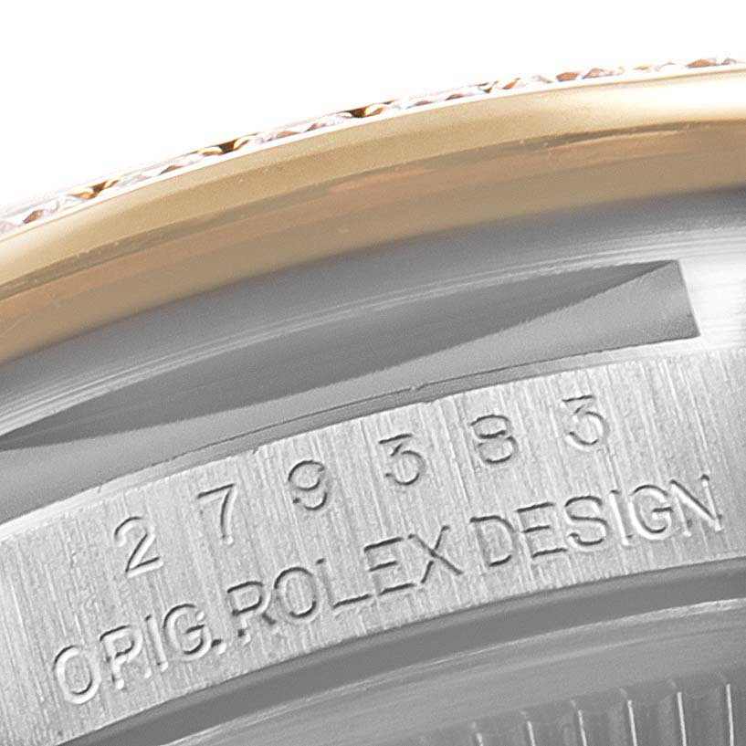 This image shows a close-up of the case with an engraving of a Rolex Datejust 279383 Women's Steel and Gold (two tone) Purple Dial 279383 Women's Steel and Gold (two tone) Purple Dial model watch.