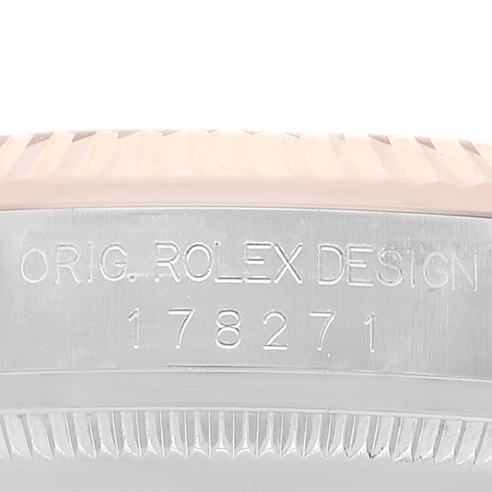 This image shows the side view of the casing for a Rolex Mid-Size 178271 Women's Steel and Gold (two tone) White Dial 178271 Women's Steel and Gold (two tone) White Dial watch, featuring the engraved model number 178271.