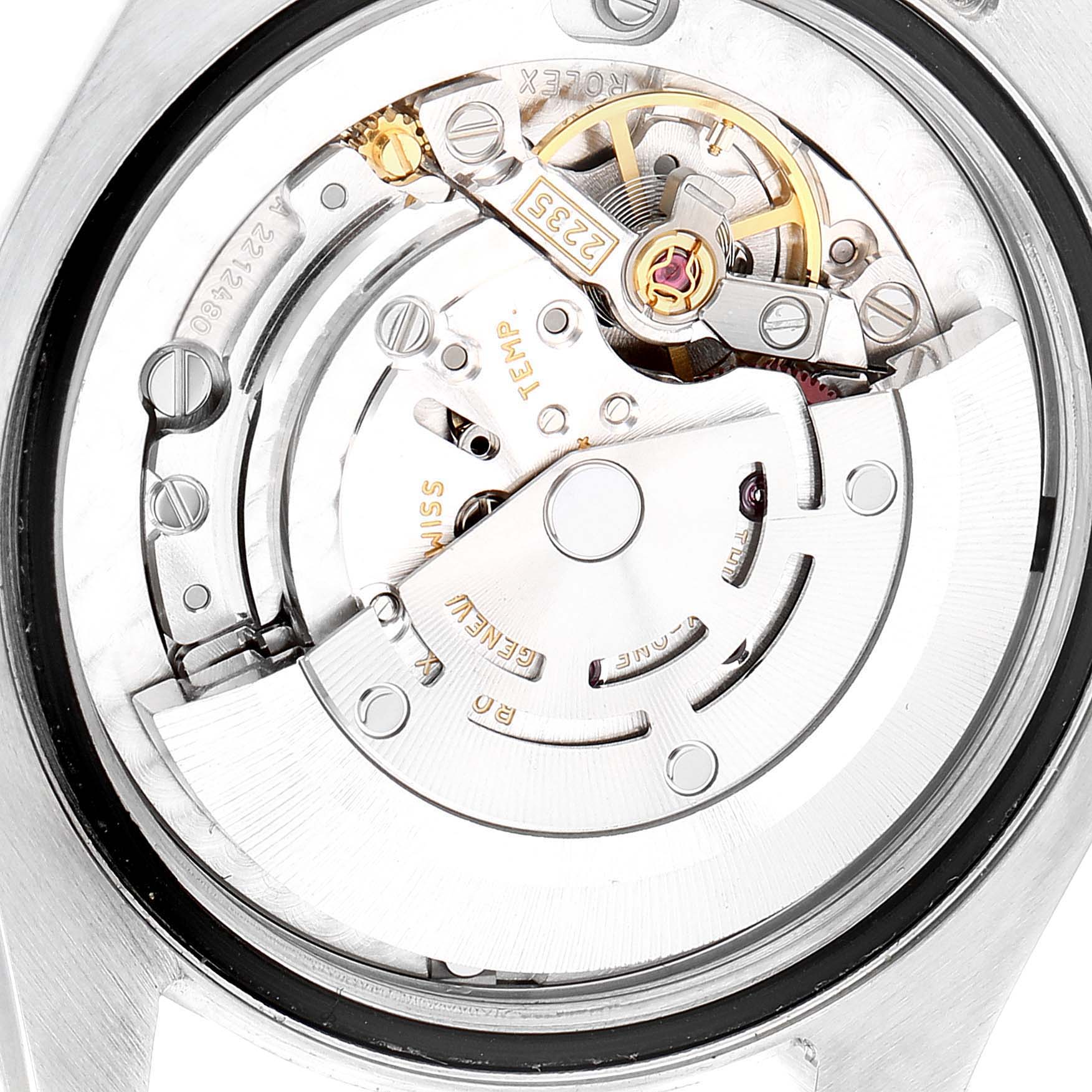 This image shows the movement and internal mechanics of a Mid-Size model Rolex watch from a close-up, top-down angle.