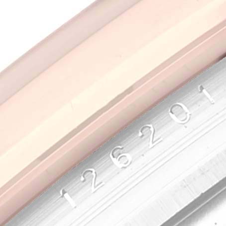 The image shows a close-up view of the case side and reference number of a Rolex Datejust 126201 Men
s Steel and Gold (two tone) Grey Dial 126201 Men
s Steel and Gold (two tone) Grey Dial watch.