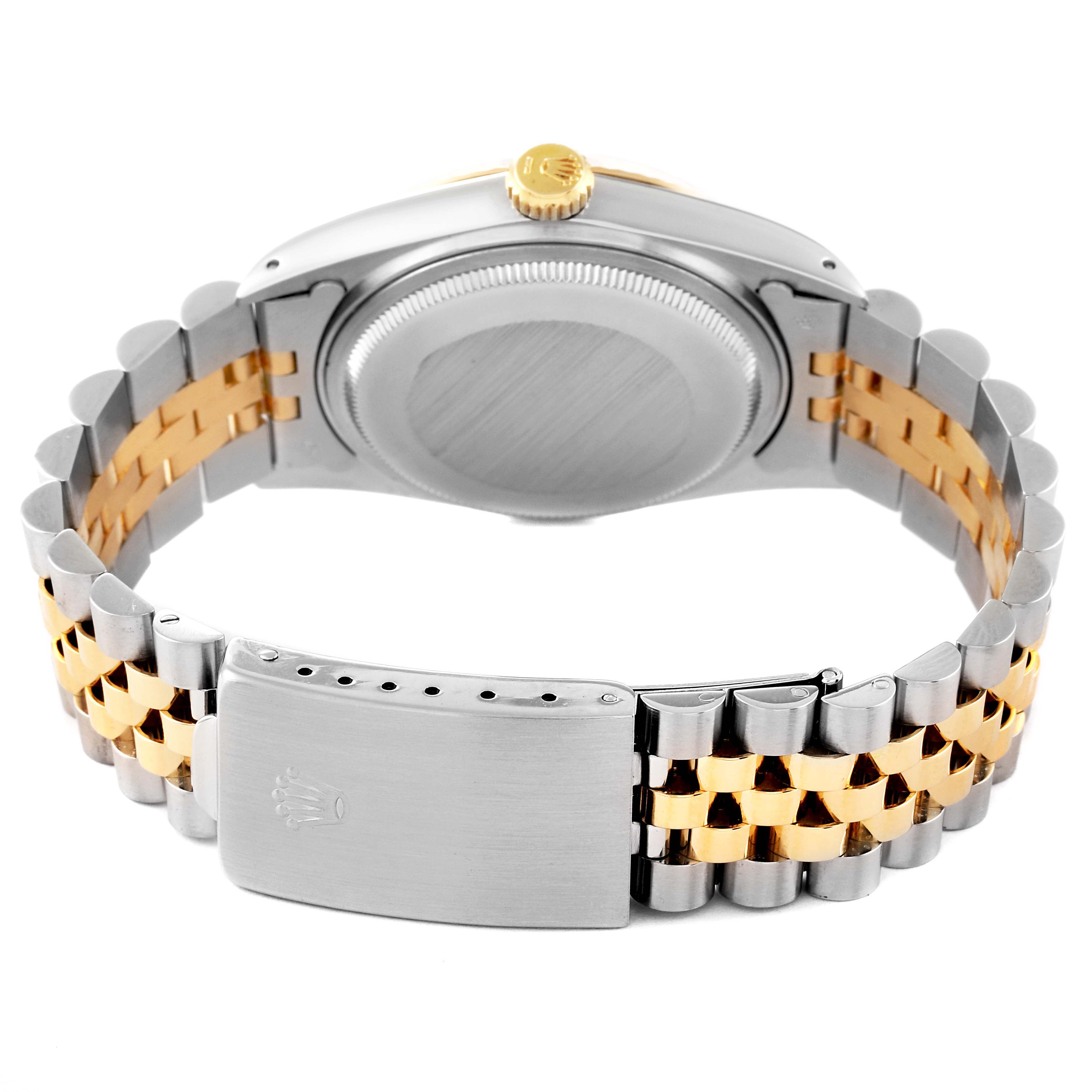 This image shows the back view of a Rolex Vintage Collection 16013 Men's Steel and Gold (two tone) Silver Dial 16013 Men's Steel and Gold (two tone) Silver Dial watch, highlighting the case back, crown, and the bracelet clasp.