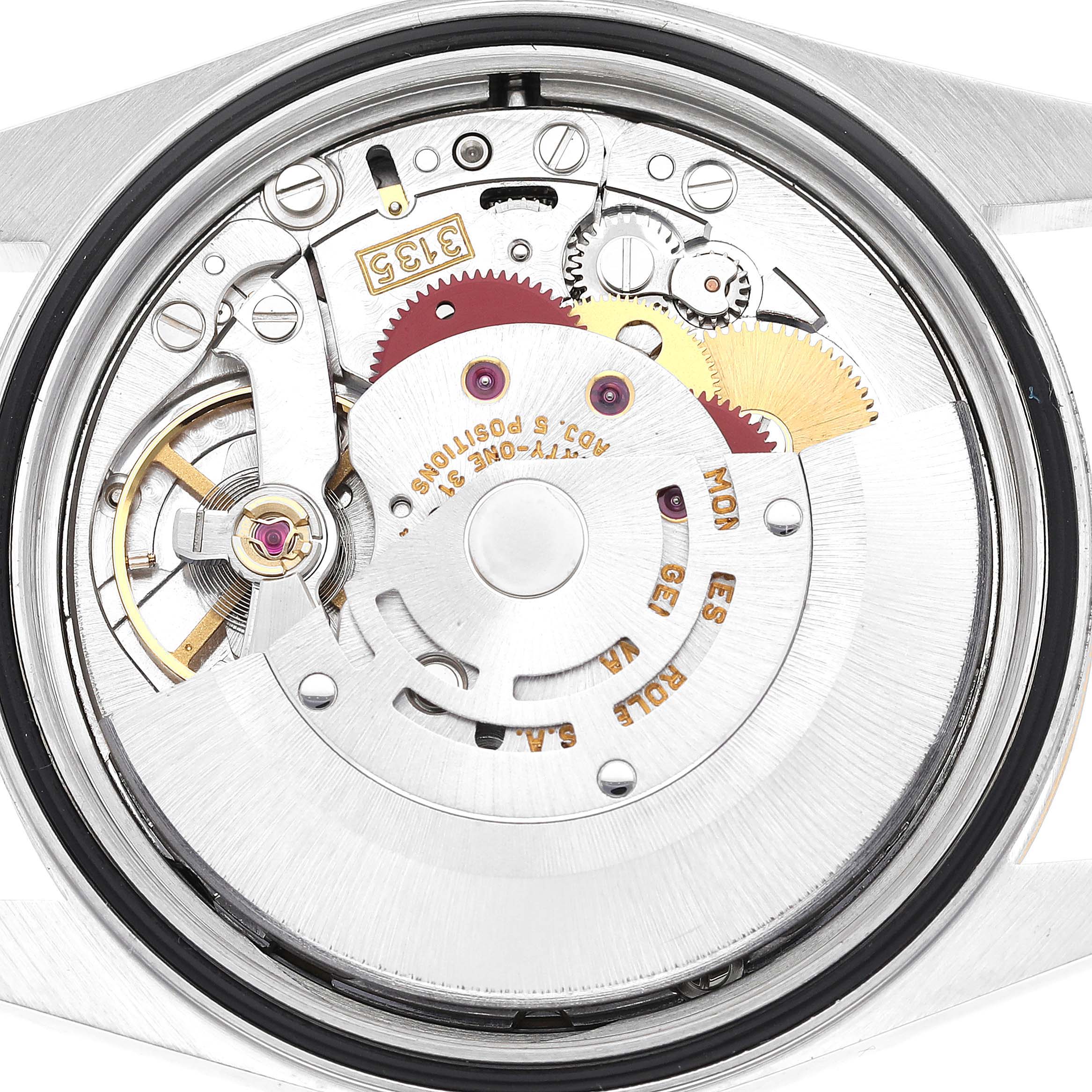 The image shows the internal mechanism of a Rolex Datejust 16233 Men's Steel and Gold (two tone) Champagne Dial 16233 Men's Steel and Gold (two tone) Champagne Dial, focusing on the movement and intricate components.