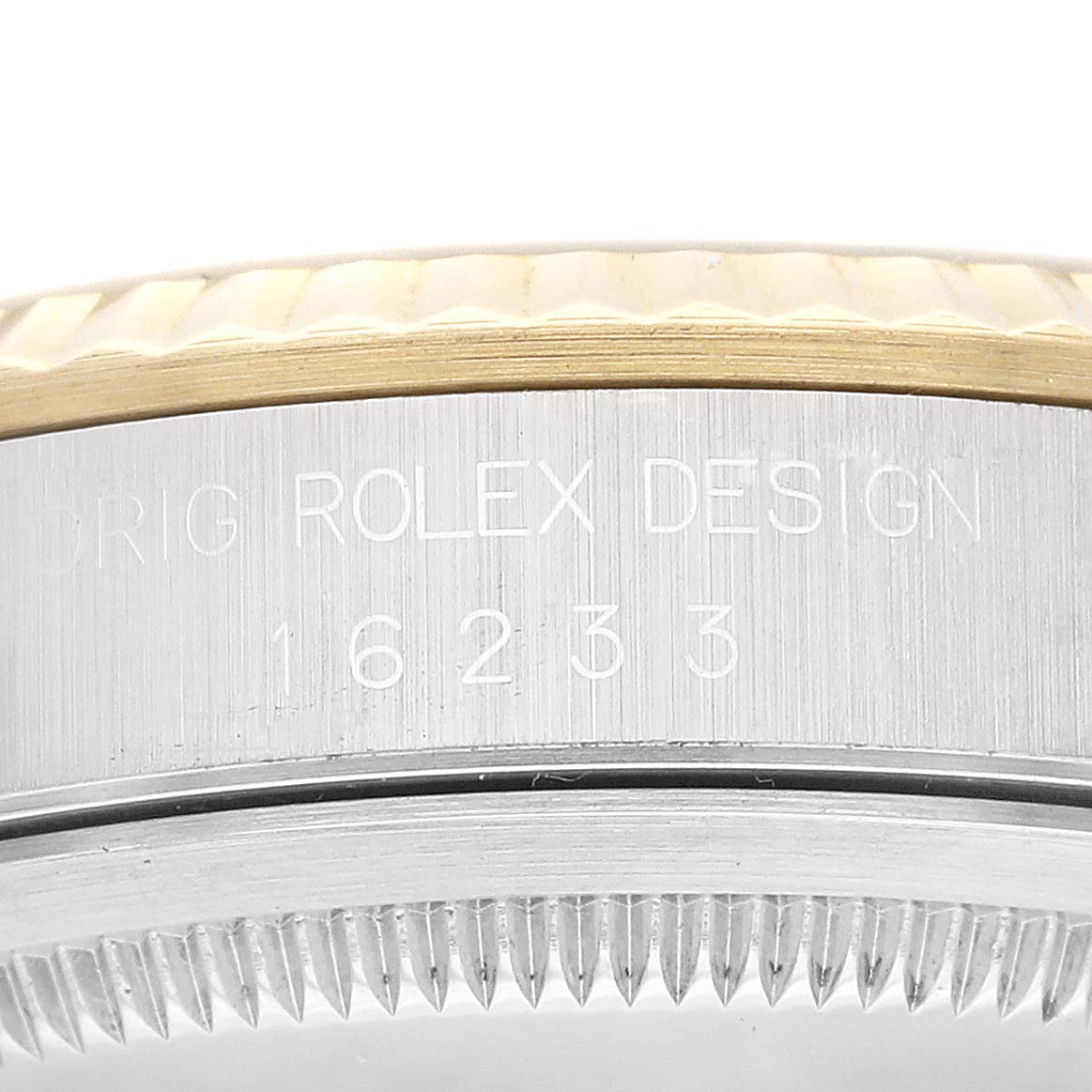 This image shows a close-up of the case side of a Rolex Datejust 16233 Men's Steel and Gold (two tone) Champagne Dial 16233 Men's Steel and Gold (two tone) Champagne Dial, highlighting the model number and part of the bezel.