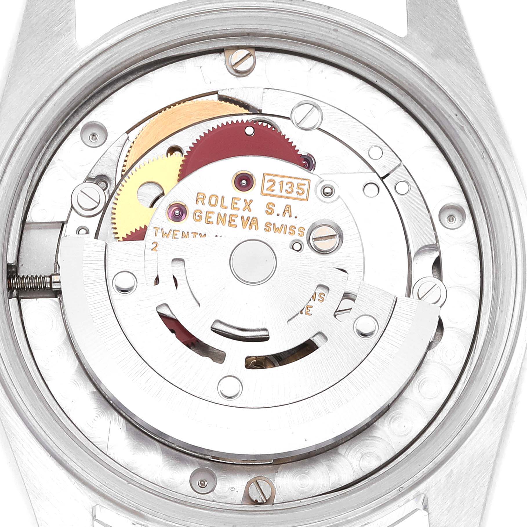 The image shows the internal mechanism of a Rolex Mid-Size 68274 Women
s Stainless Steel Silver Dial 68274 Women
s Stainless Steel Silver Dial watch, focusing on the movement and intricate components.