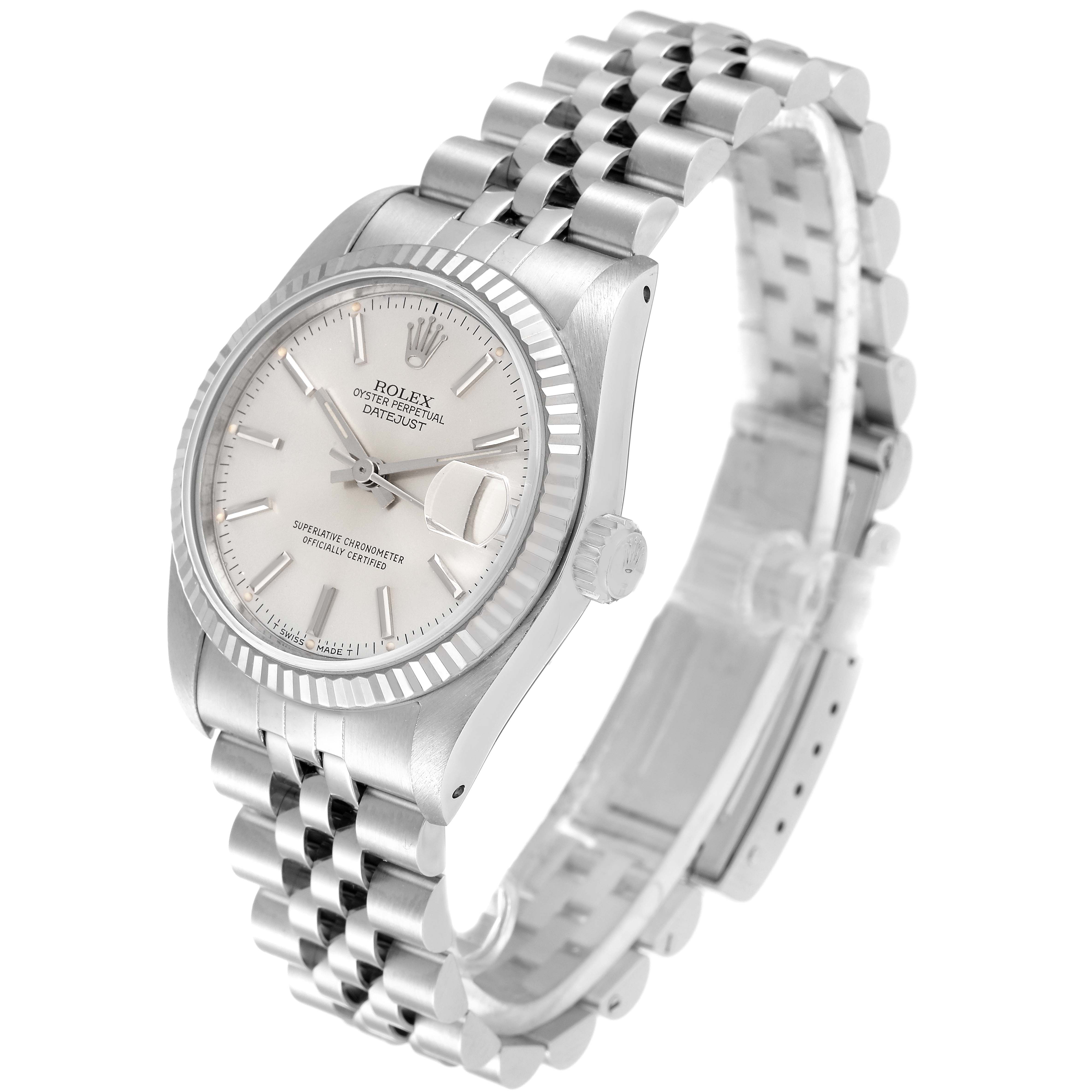 This image shows the Rolex Mid-Size 68274 Women
s Stainless Steel Silver Dial 68274 Women
s Stainless Steel Silver Dial Datejust watch at an oblique top view, displaying the dial, bezel, crown, and bracelet.