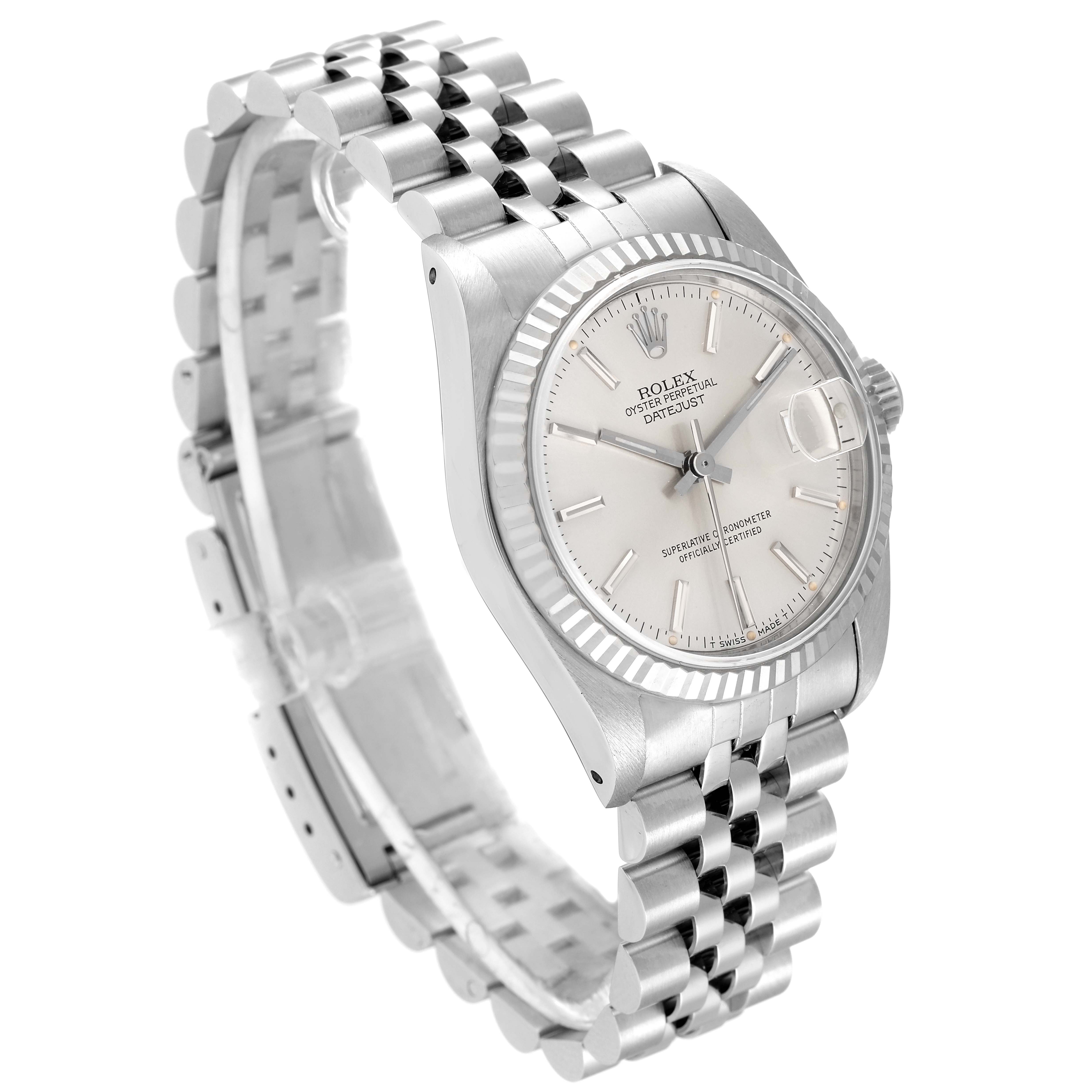 The image shows a Rolex Mid-Size 68274 Women
s Stainless Steel Silver Dial 68274 Women
s Stainless Steel Silver Dial Datejust watch angled from the front and left side, highlighting the dial, bezel, and bracelet.