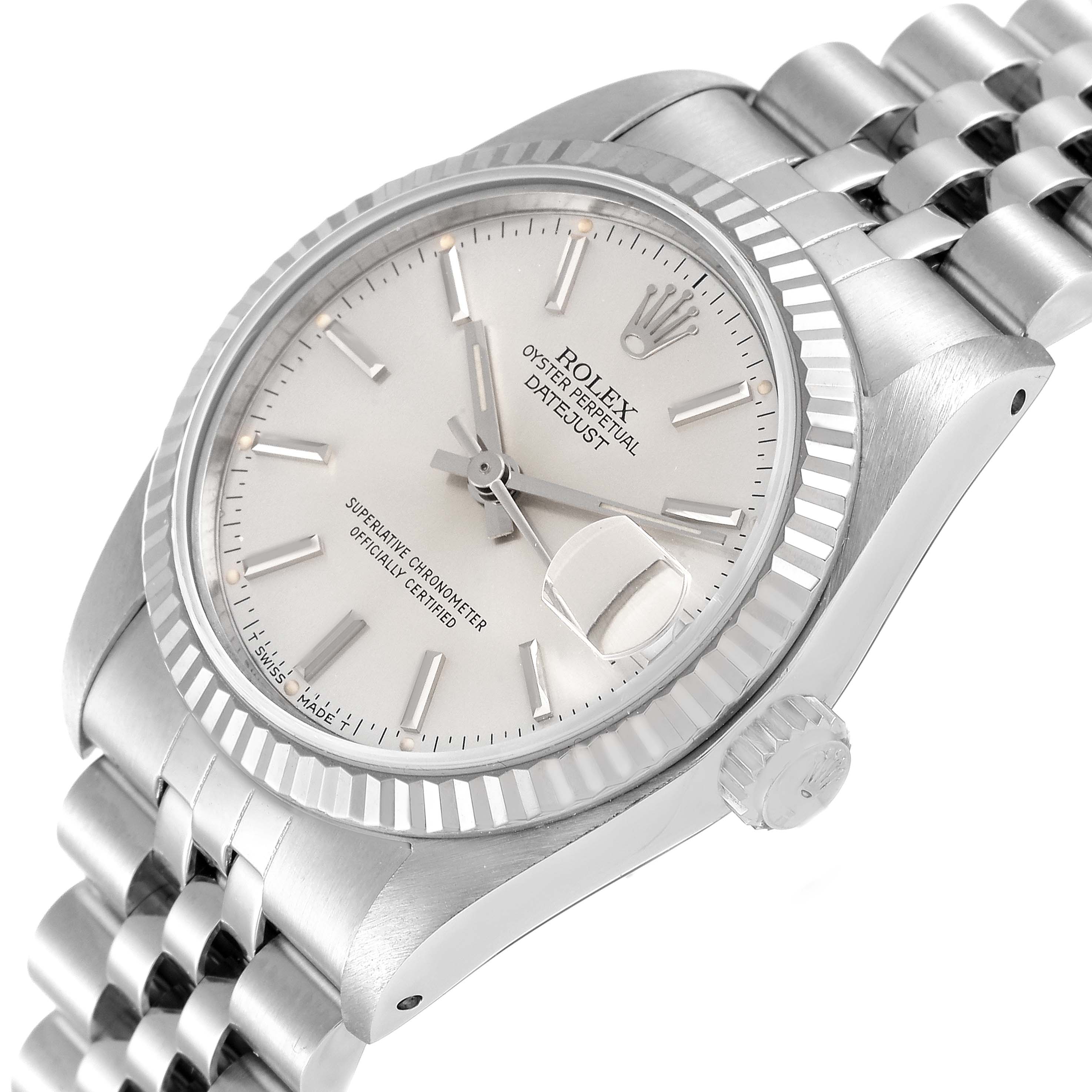 The image shows a tilted angle of the Rolex Mid-Size 68274 Women
s Stainless Steel Silver Dial 68274 Women
s Stainless Steel Silver Dial Oyster Perpetual Datejust watch, highlighting its dial, bezel, crown, and bracelet.