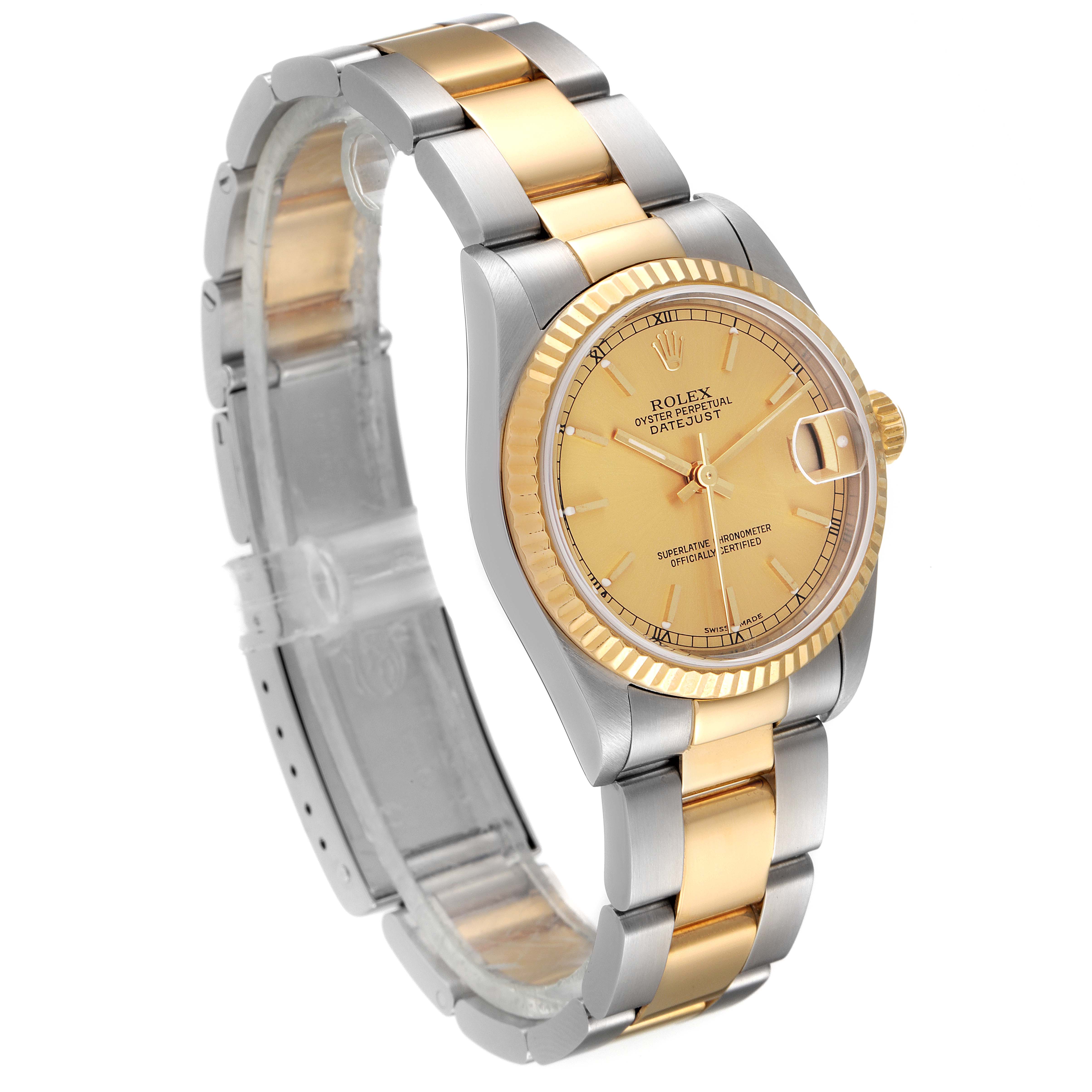The image shows a Rolex Mid-Size 78273 Women's Steel and Gold (two tone) Champagne Dial 78273 Women's Steel and Gold (two tone) Champagne Dial Datejust watch at a 3/4th angle, highlighting its dial, bezel, and two-tone bracelet.