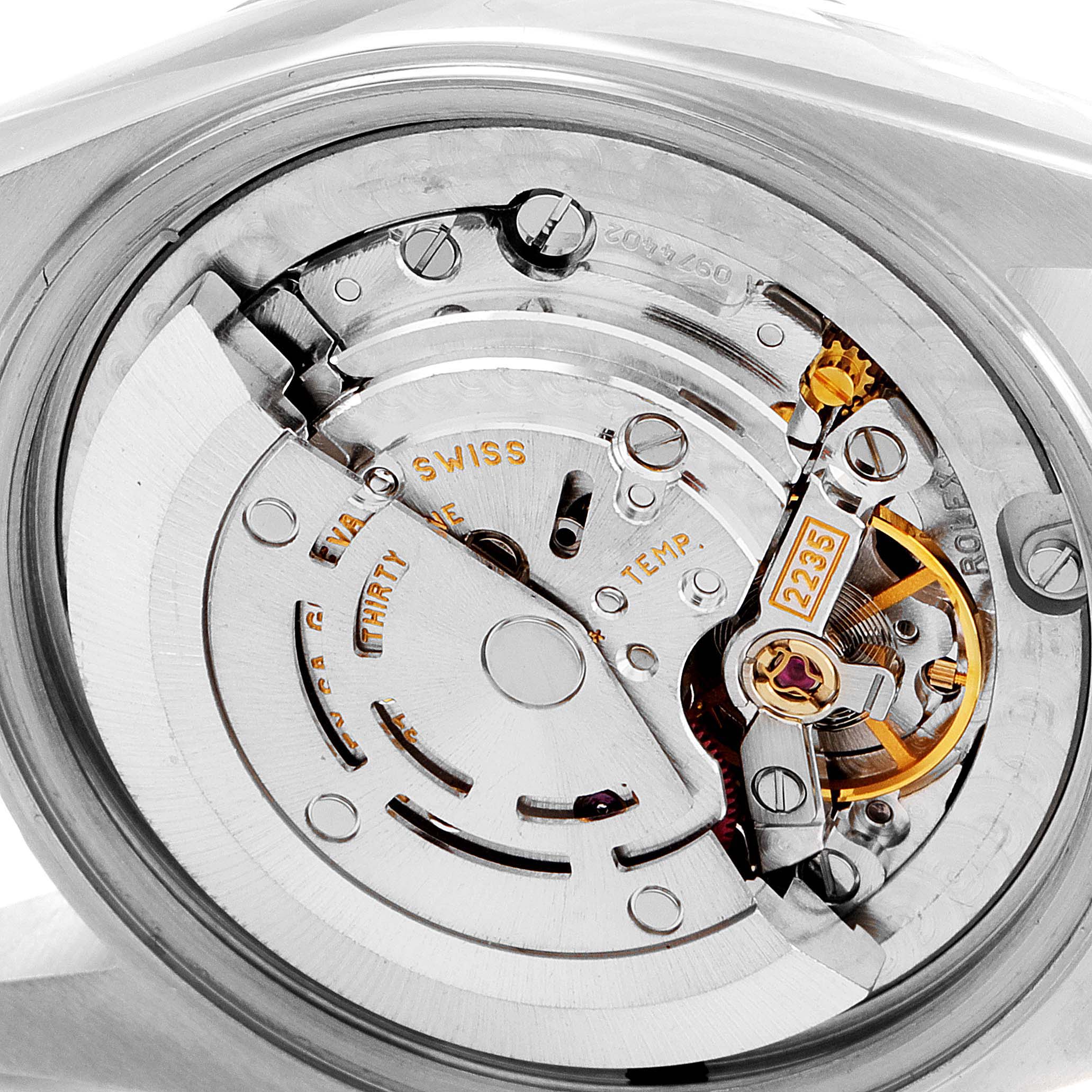 This image shows the movement and internal components of a Rolex Mid-Size 78273 Women's Steel and Gold (two tone) Champagne Dial 78273 Women's Steel and Gold (two tone) Champagne Dial model watch from a rear angle.