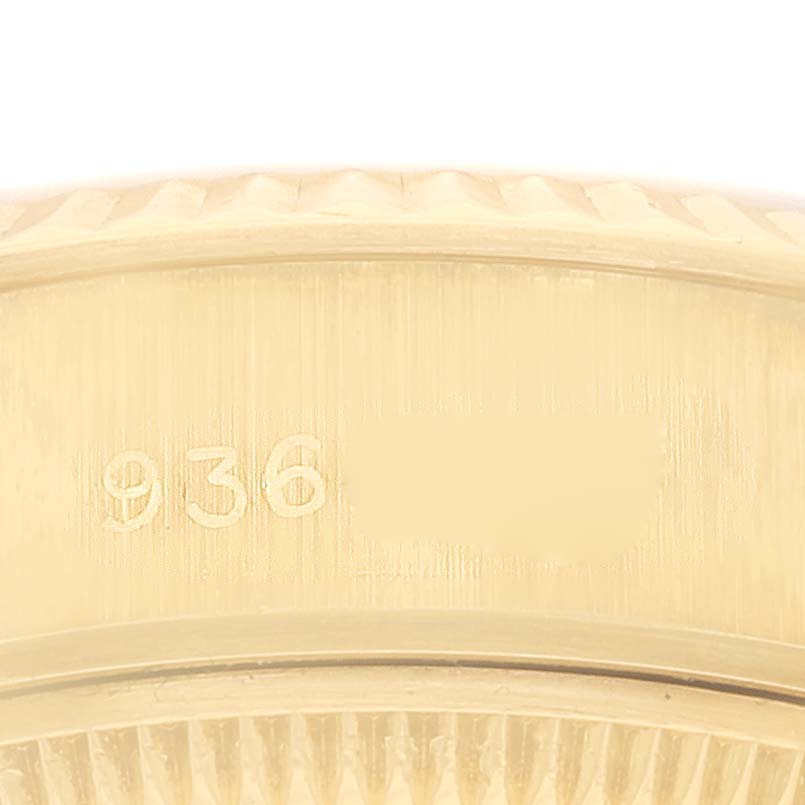 The image shows a close-up of the serial number engraved on the bezel of the Rolex President 69178 Women
s Yellow Gold Champagne Dial 69178 Women
s Yellow Gold Champagne Dial model watch.