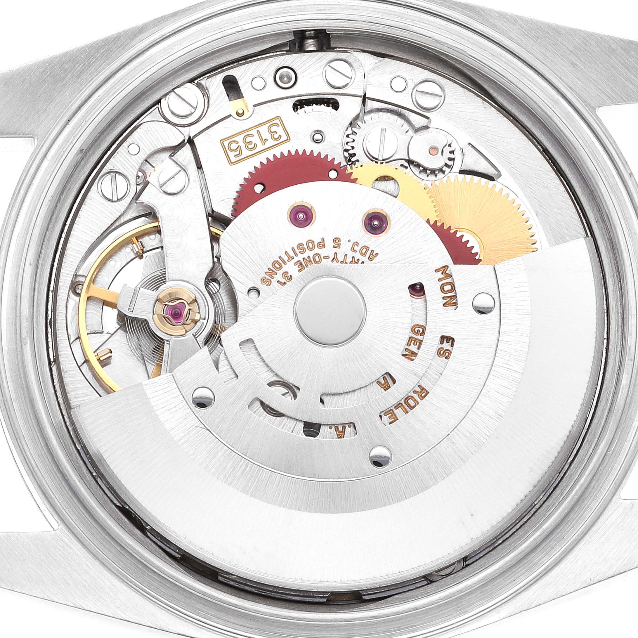 The image shows a close-up view of the movement and inner mechanics of a Rolex Datejust 16233 Men's Steel and Gold (two tone) Champagne Dial 16233 Men's Steel and Gold (two tone) Champagne Dial watch.
