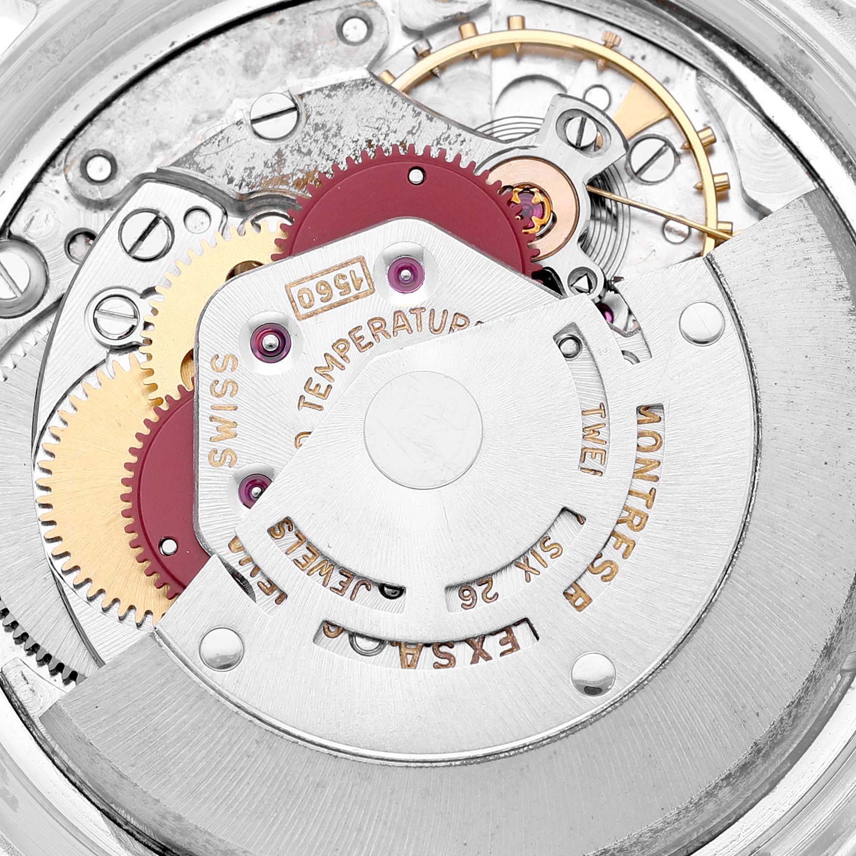 Close-up view of the intricate movement and gears of a Rolex Vintage Collection 1601 Men's Stainless Steel Silver Dial 1601 Men's Stainless Steel Silver Dial watch.