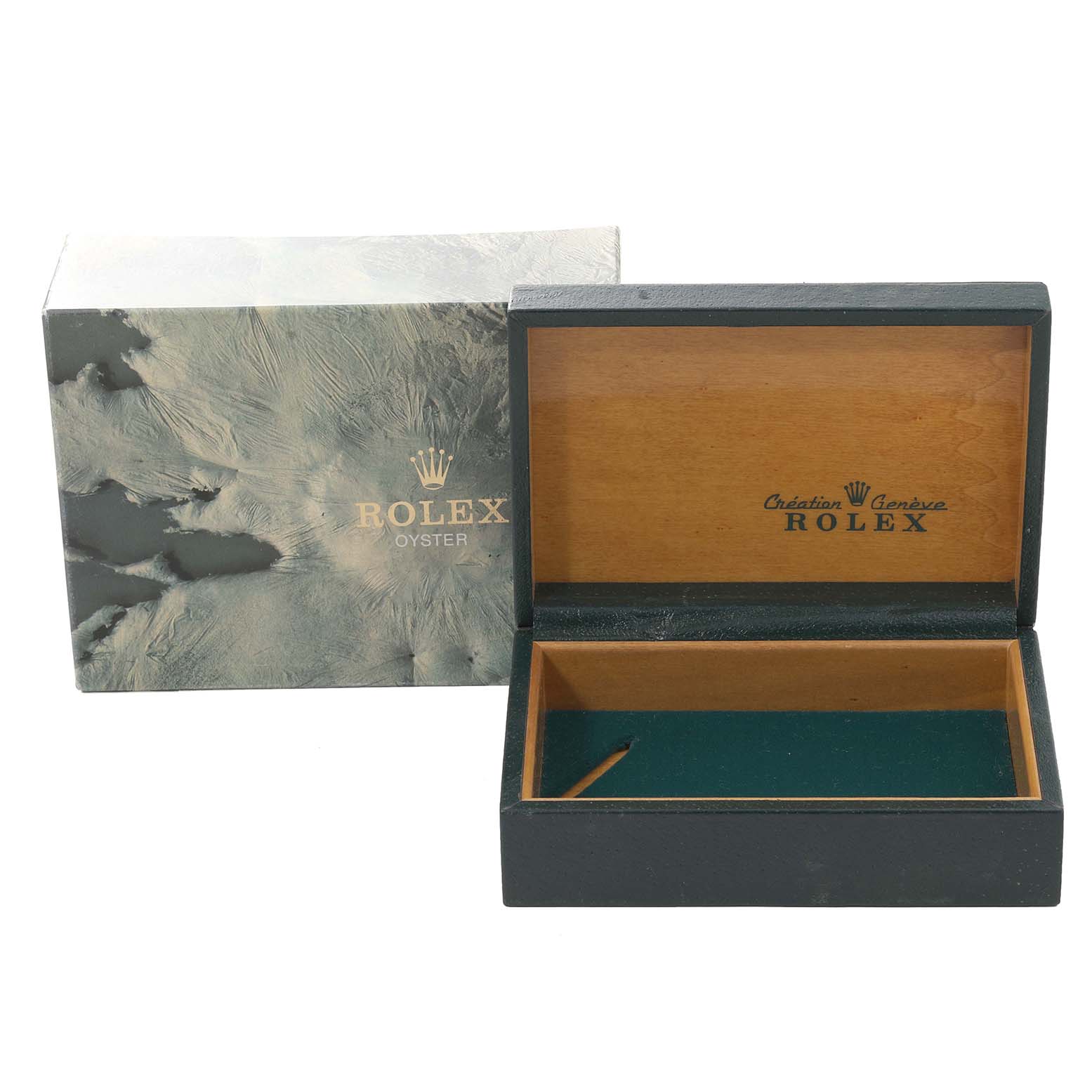 This image shows an open watch box and packaging for the Vintage Collection model by Rolex, with "ROLEX OYSTER" text visible.