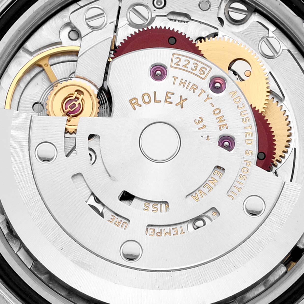 The image shows an angled close-up of the movement mechanism inside the Rolex Datejust 279384 Women's Stainless Steel Mother of Pearl Dial 279384 Women's Stainless Steel Mother of Pearl Dial watch, including gears and the rotor.