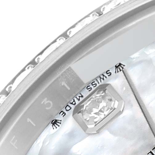 This close-up shows the dial of a Rolex Datejust 279384 Women's Stainless Steel Mother of Pearl Dial 279384 Women's Stainless Steel Mother of Pearl Dial model, highlighting the Swiss Made text and a diamond marker.
