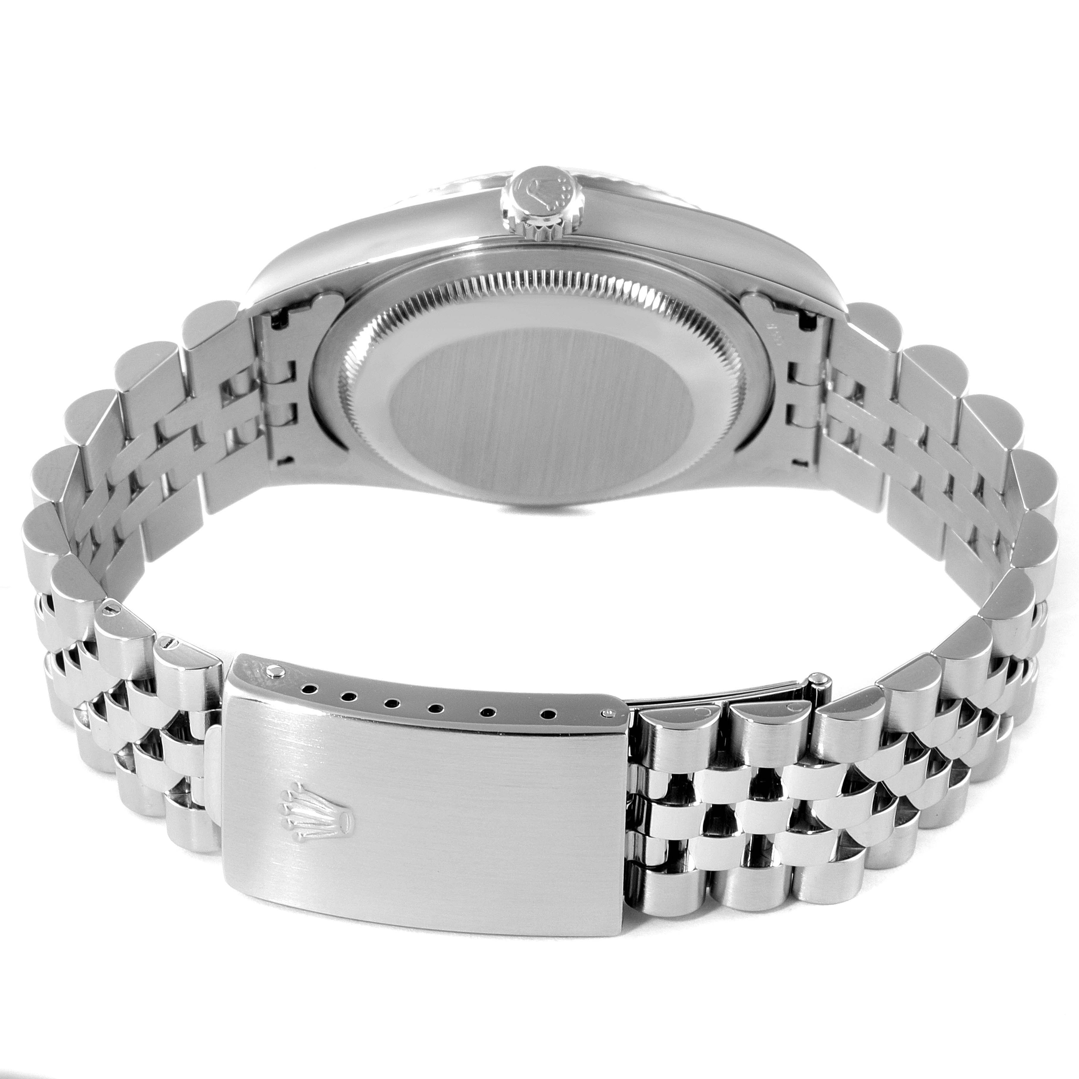 This image shows the back view of a Rolex Datejust 16234 Men's Stainless Steel Silver Dial 16234 Men's Stainless Steel Silver Dial watch, highlighting its bracelet and clasp.