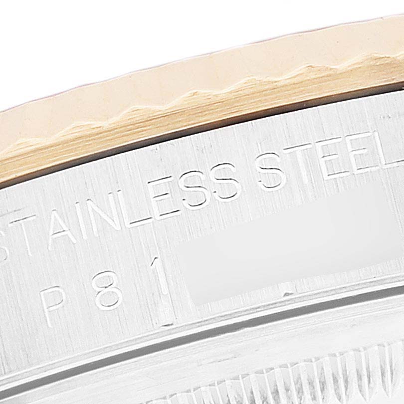 This close-up image shows the side of the Rolex Datejust 16233 Men's Steel and Gold (two tone) Black Dial 16233 Men's Steel and Gold (two tone) Black Dial model, highlighting the stainless steel part of the bezel.