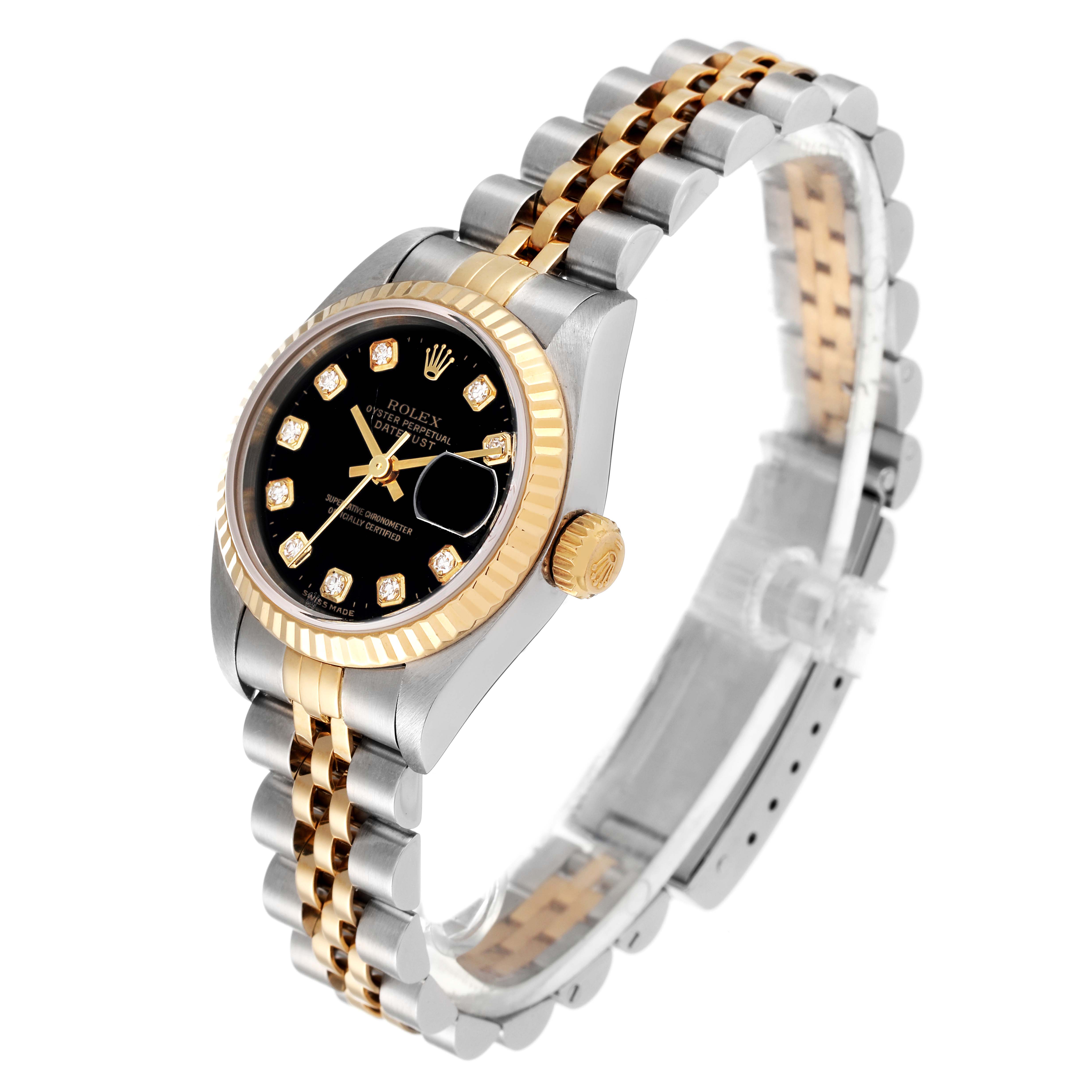 The Rolex Datejust 79173 Women's Steel and Gold (two tone) Black Dial 79173 Women's Steel and Gold (two tone) Black Dial watch is shown at an angle highlighting its black dial, gold bezel, and two-tone metal bracelet.