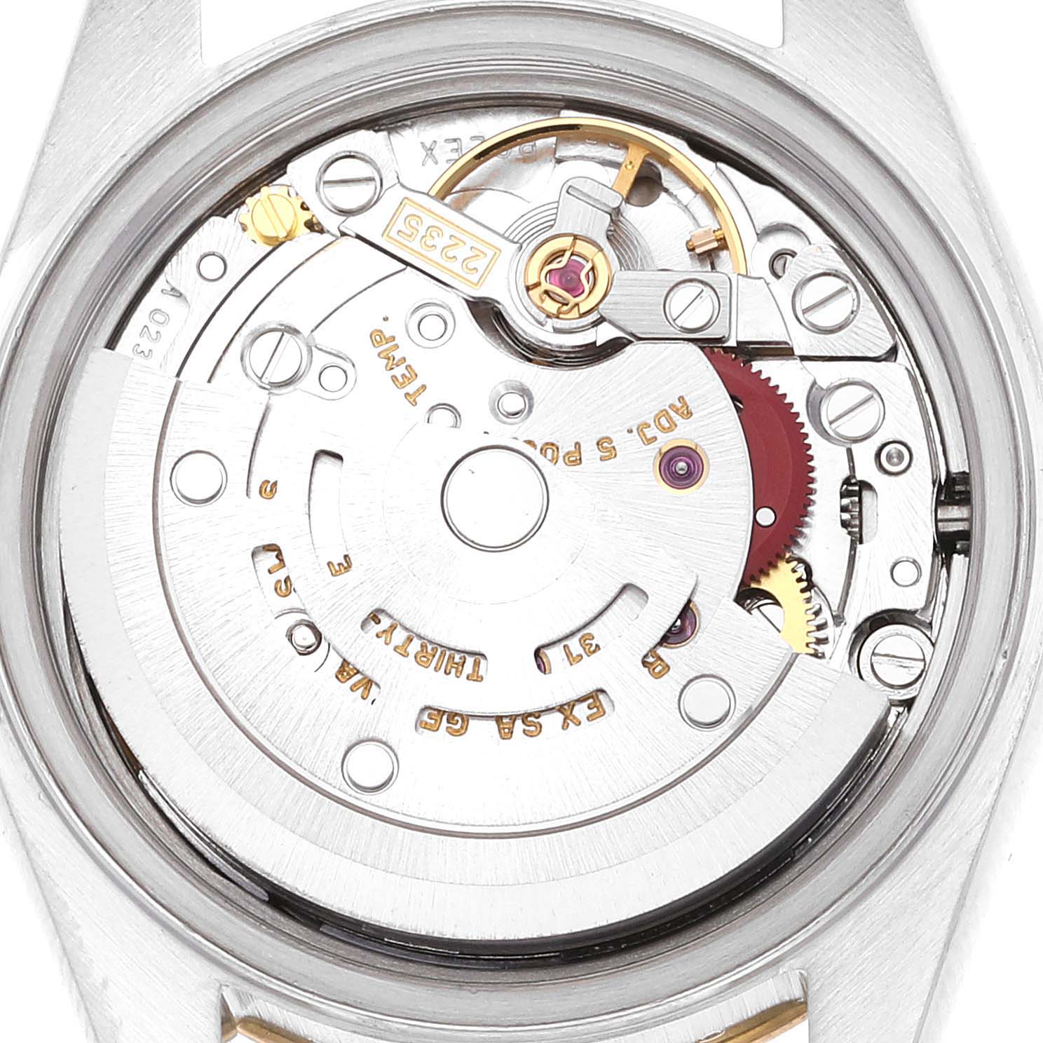 This image shows an internal view of the movement mechanism of a Rolex Datejust 79173 Women's Steel and Gold (two tone) Blue Dial 79173 Women's Steel and Gold (two tone) Blue Dial watch.