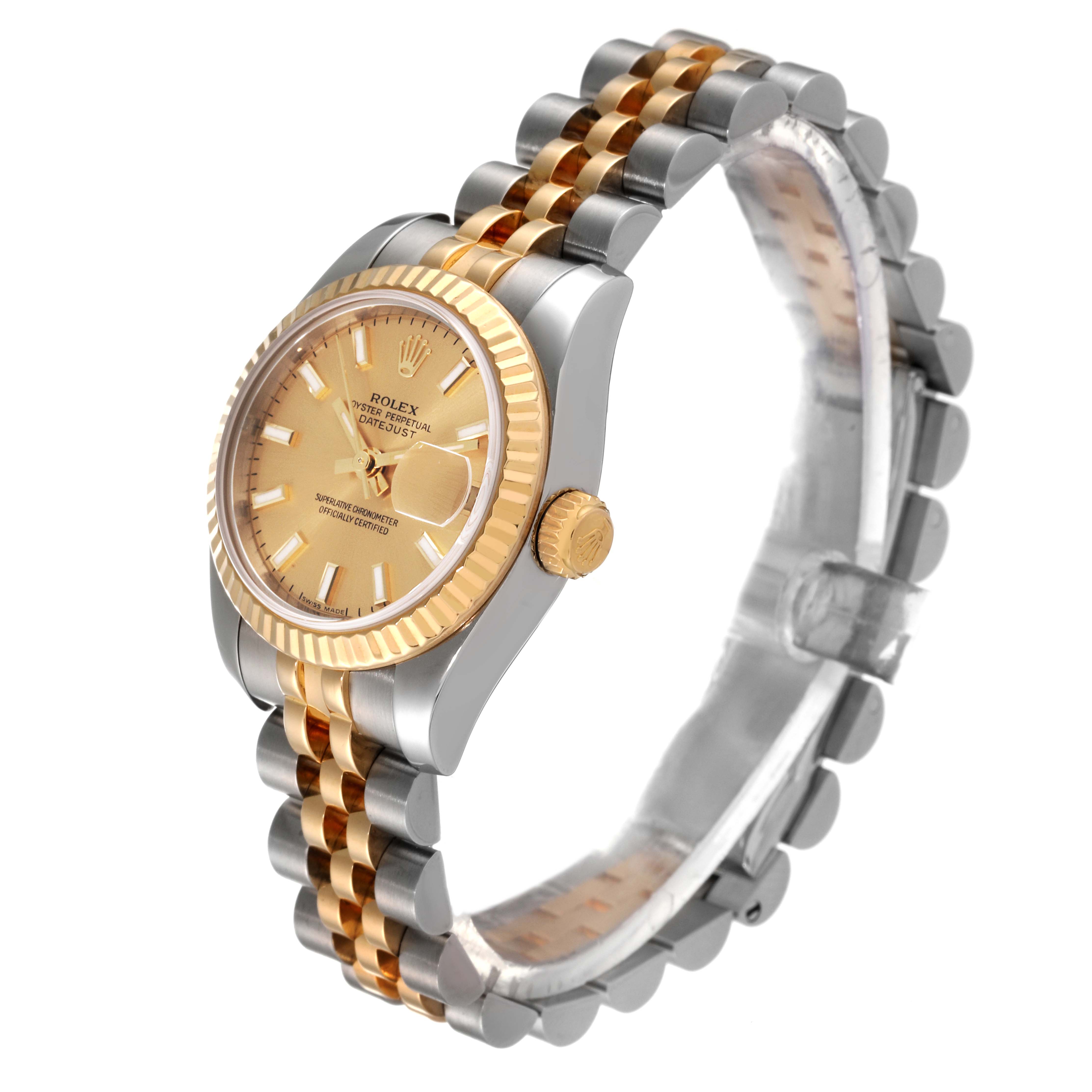The image shows a Rolex Datejust 179173 Women's Steel and Gold (two tone) Champagne Dial 179173 Women's Steel and Gold (two tone) Champagne Dial watch from an angled perspective displaying its gold and silver bracelet, dial, and crown.