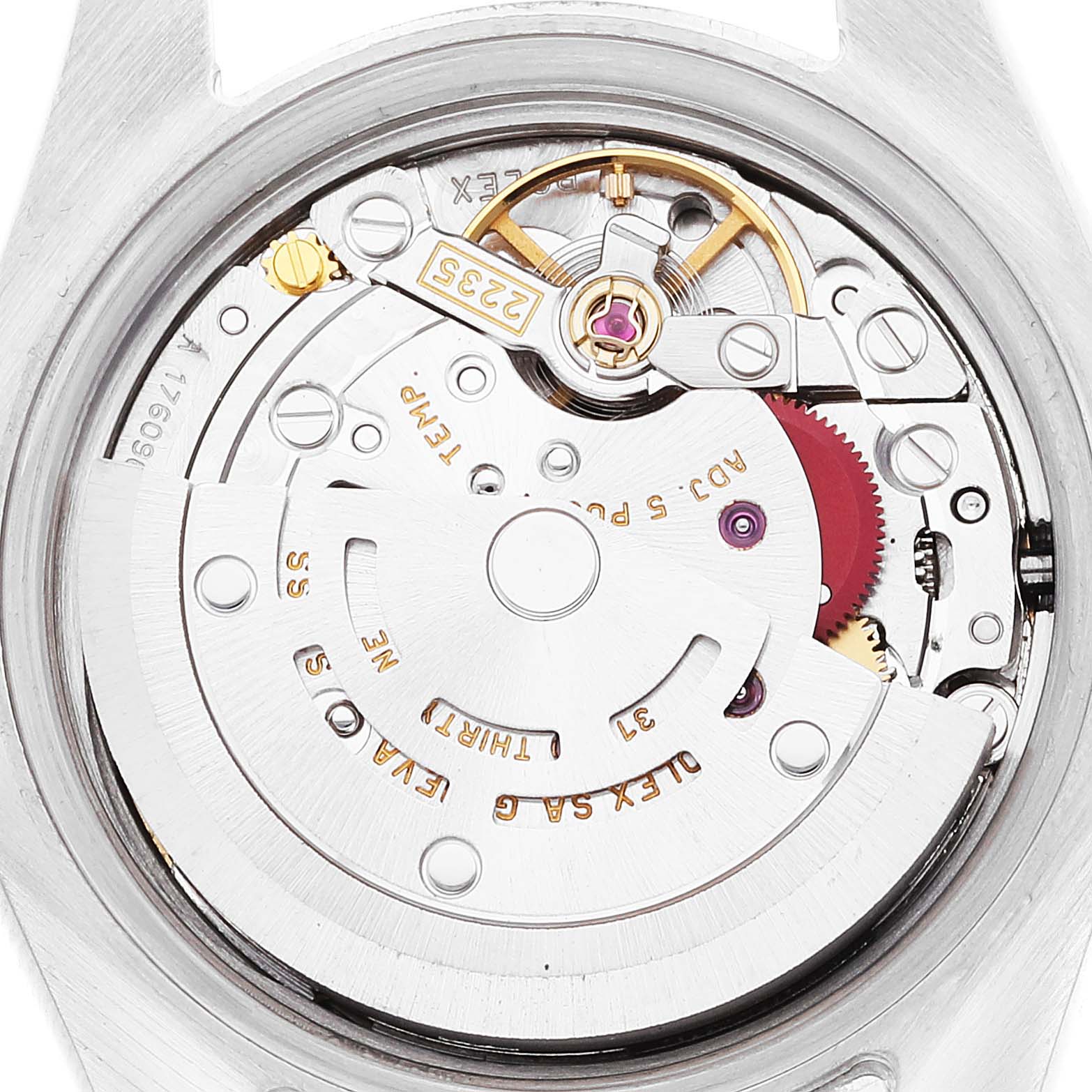 This image shows a close-up of the movement mechanism of a Rolex Datejust 179173 Women's Steel and Gold (two tone) Champagne Dial 179173 Women's Steel and Gold (two tone) Champagne Dial watch.