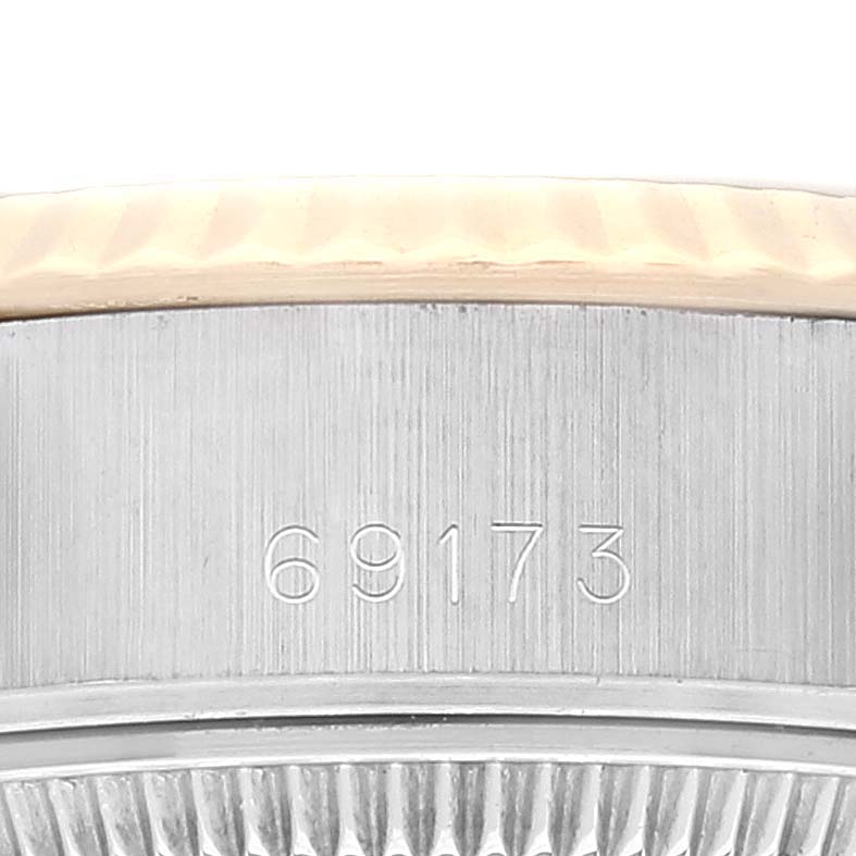This image shows a close-up of the model number engraving on the side of the Rolex Datejust 69173 Women's Steel and Gold (two tone) Champagne Dial 69173 Women's Steel and Gold (two tone) Champagne Dial watch case.