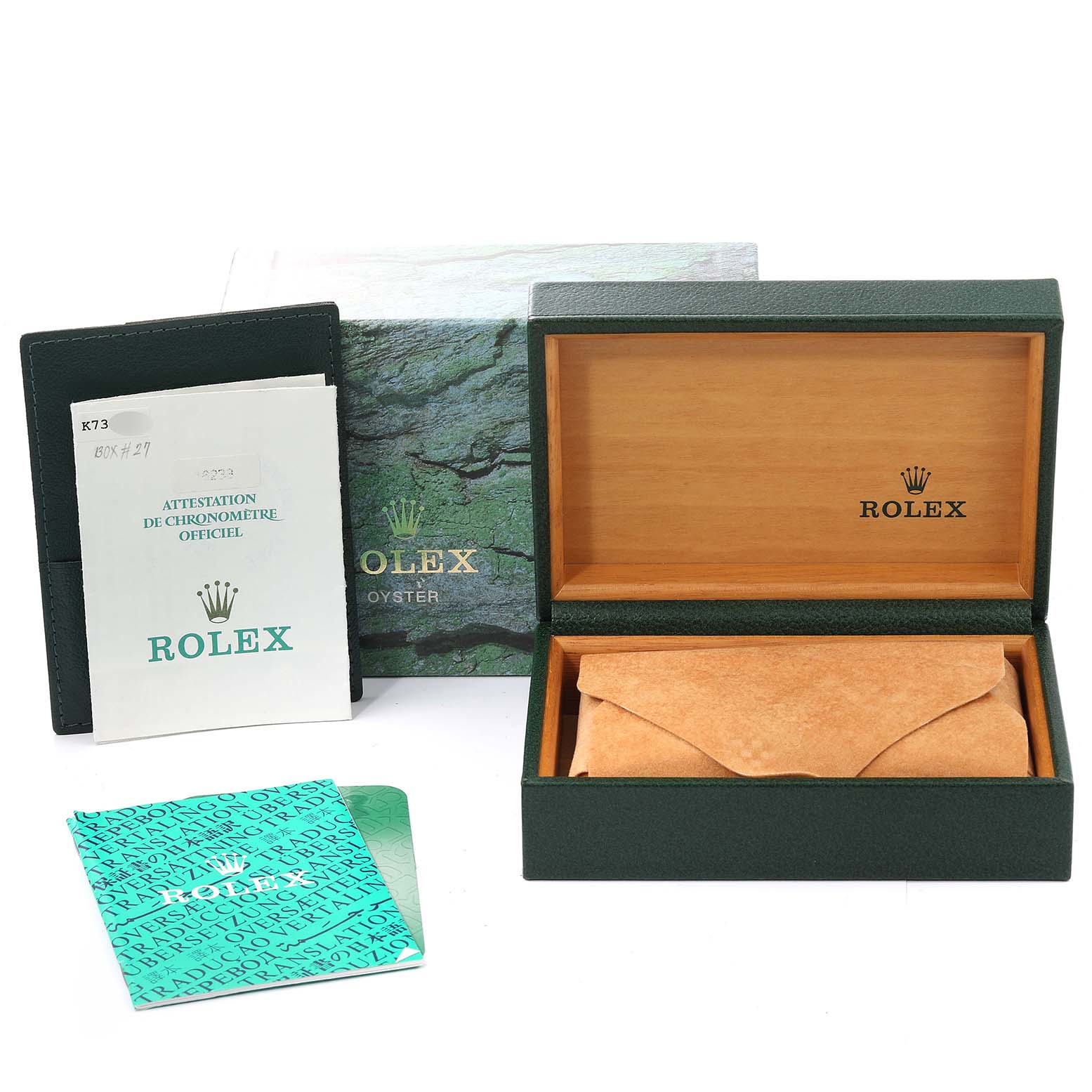 Image shows Rolex Datejust 16233 Men's Steel and Gold (two tone) Silver Dial 16233 Men's Steel and Gold (two tone) Silver Dial packaging including an open box, paper inserts, and a watch case.