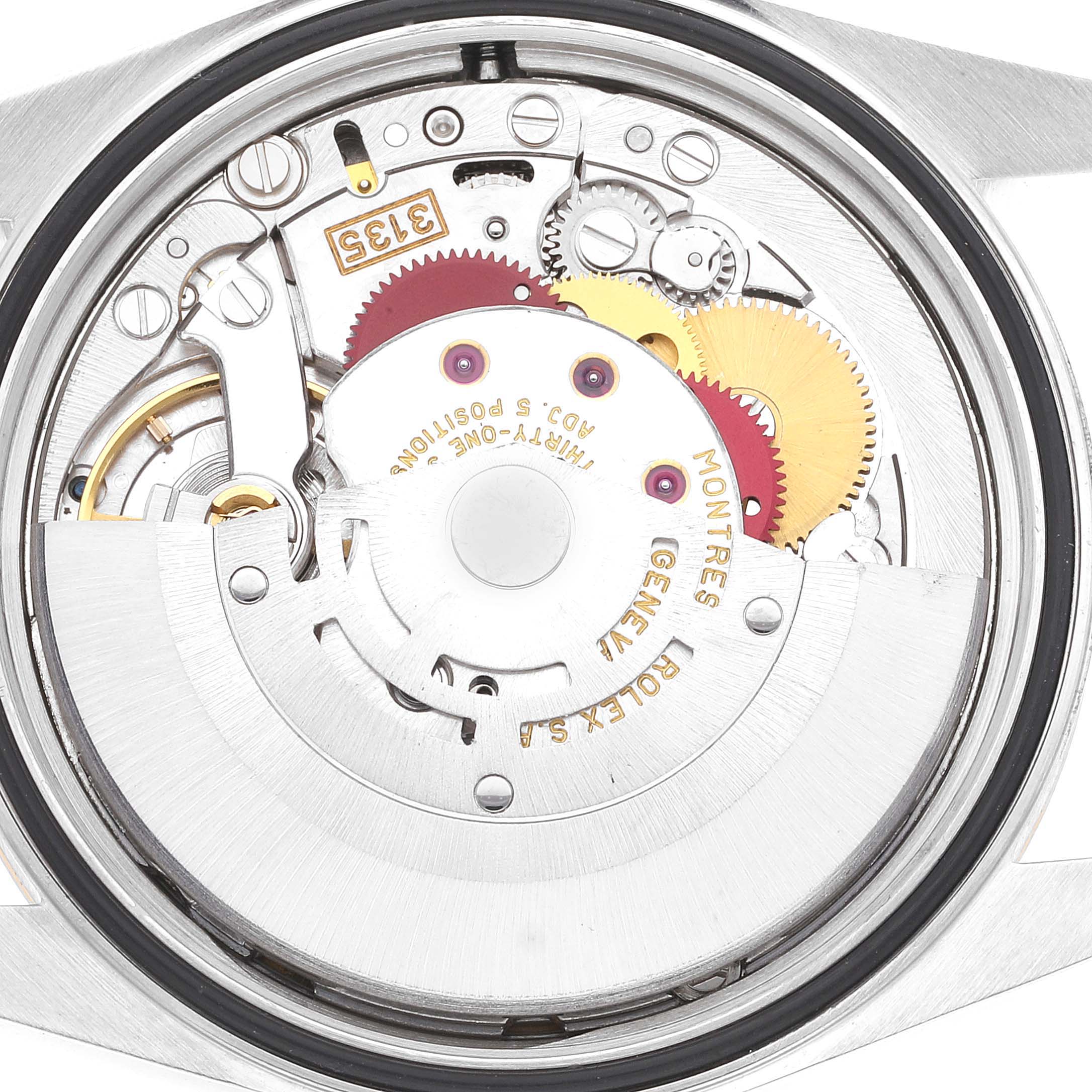 This image shows the inner movement and mechanical parts of a Rolex Datejust 16233 Men's Steel and Gold (two tone) White Dial 16233 Men's Steel and Gold (two tone) White Dial watch from a rear angle.