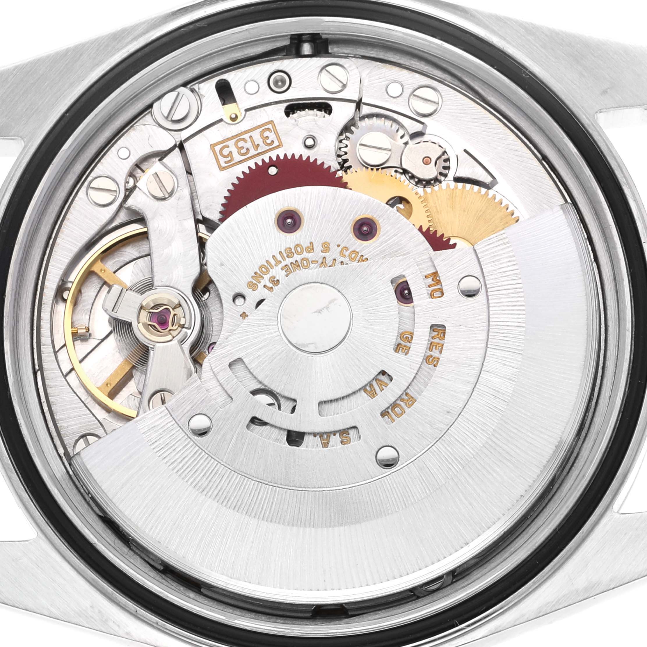This image shows the intricate interior mechanism of a Rolex Datejust 16233 Men's Steel and Gold (two tone) White Dial 16233 Men's Steel and Gold (two tone) White Dial watch, viewed from the back.