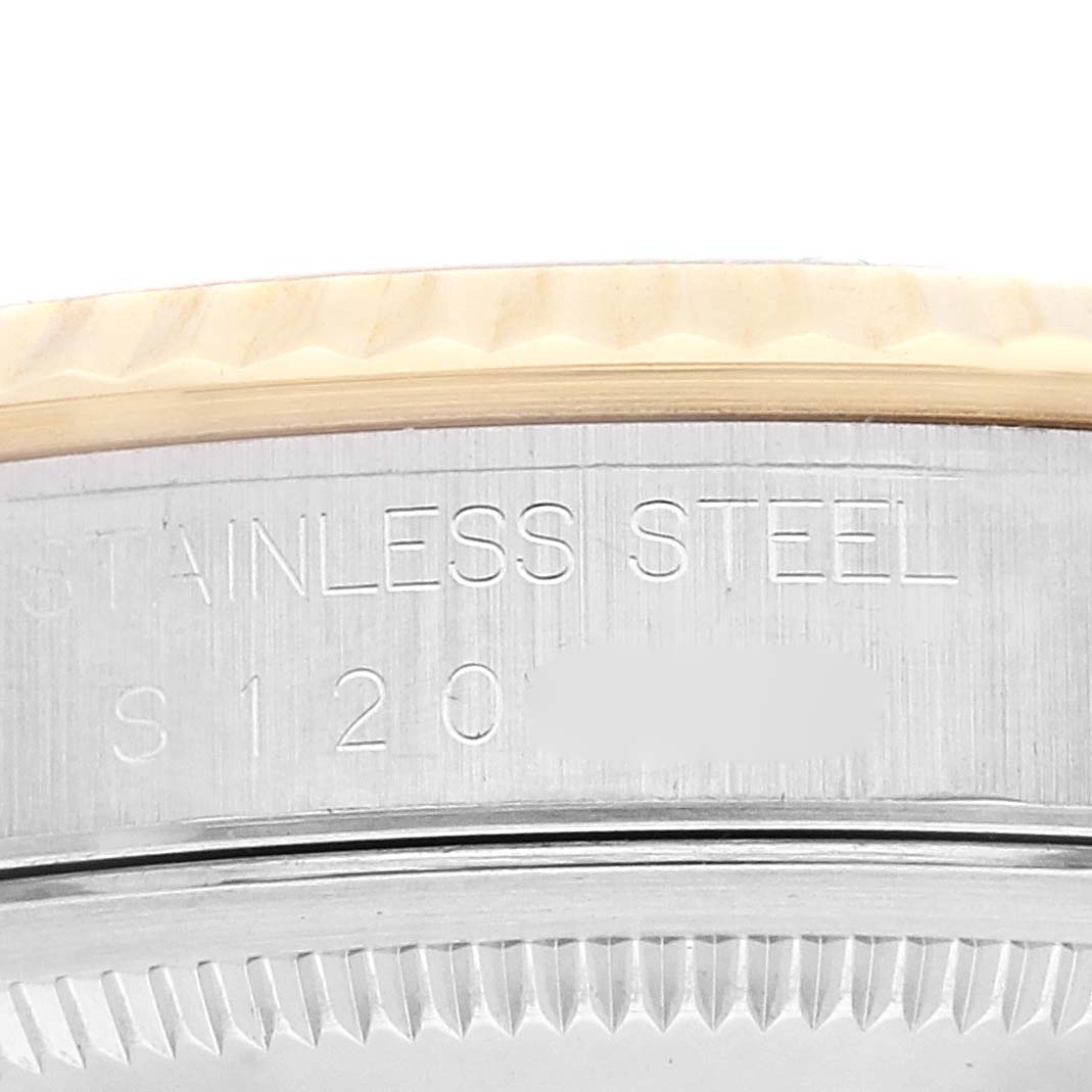 The image shows a close-up of the case side with "STAINLESS STEEL" markings of a Rolex Datejust 16233 Men's Steel and Gold (two tone) White Dial 16233 Men's Steel and Gold (two tone) White Dial watch.
