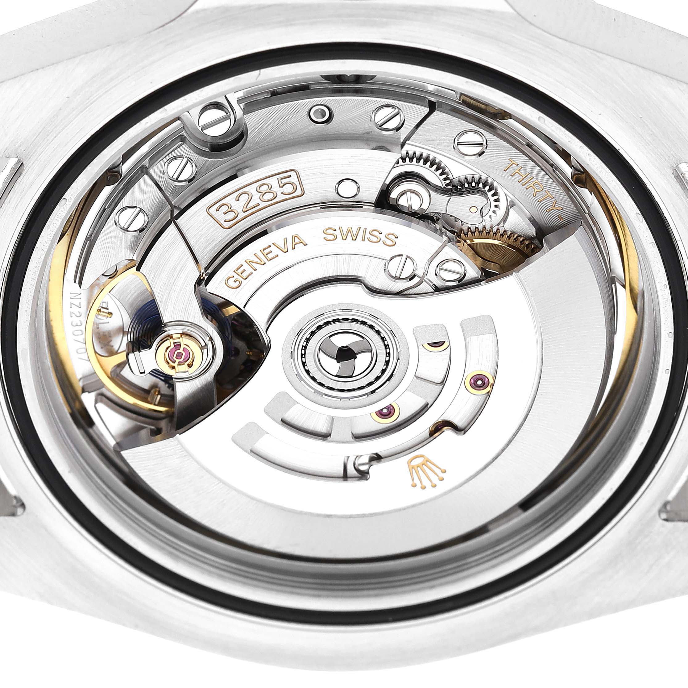 This image shows the movement mechanism of a Rolex Explorer 226570 Men
s Stainless Steel Black Dial 226570 Men
s Stainless Steel Black Dial model from a close-up, rear angle.