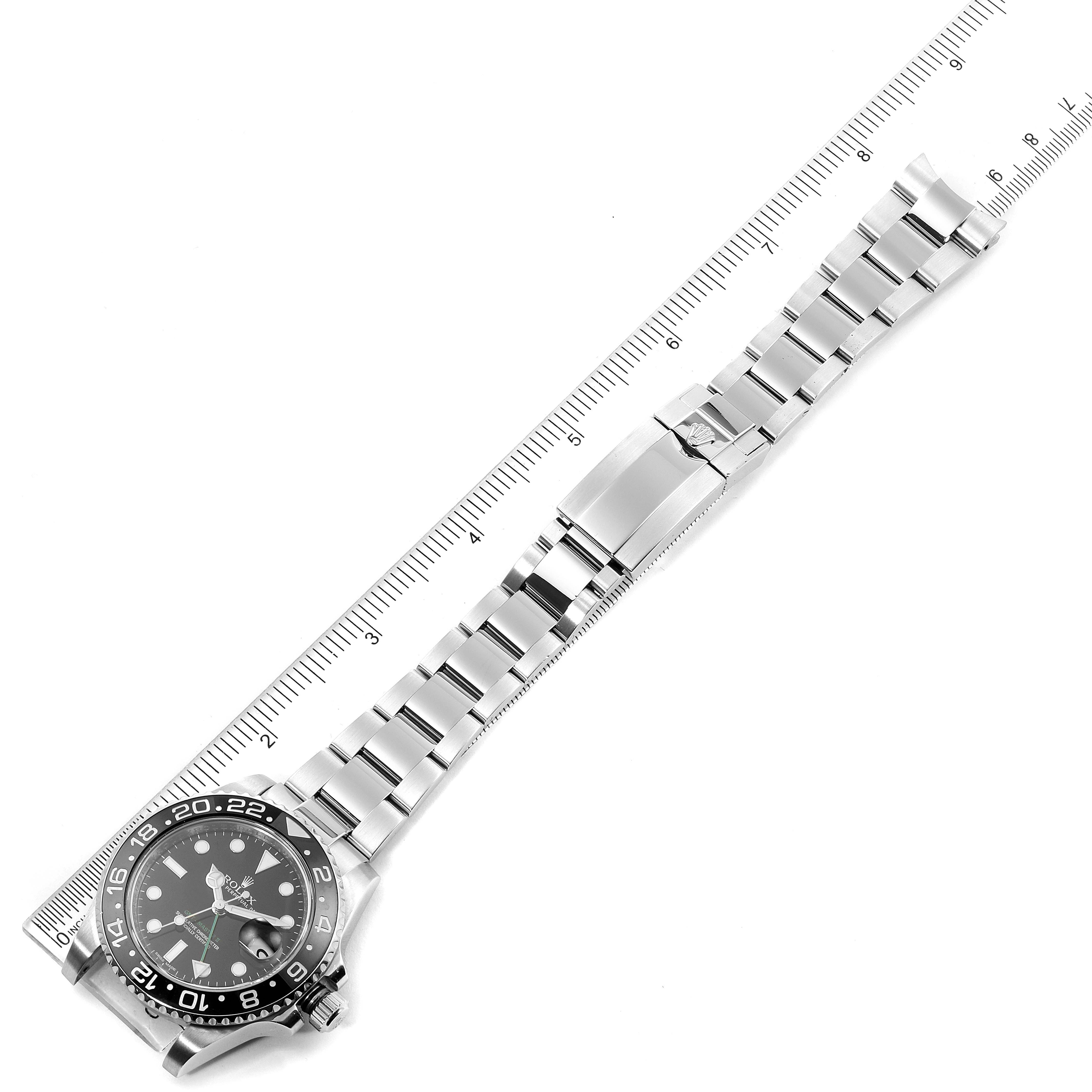 The Rolex GMT-Master 116710 Men
s Stainless Steel Black Dial 116710 Men
s Stainless Steel Black Dial watch is shown from a top-down angle, including the face, bezel, bracelet, and clasp.