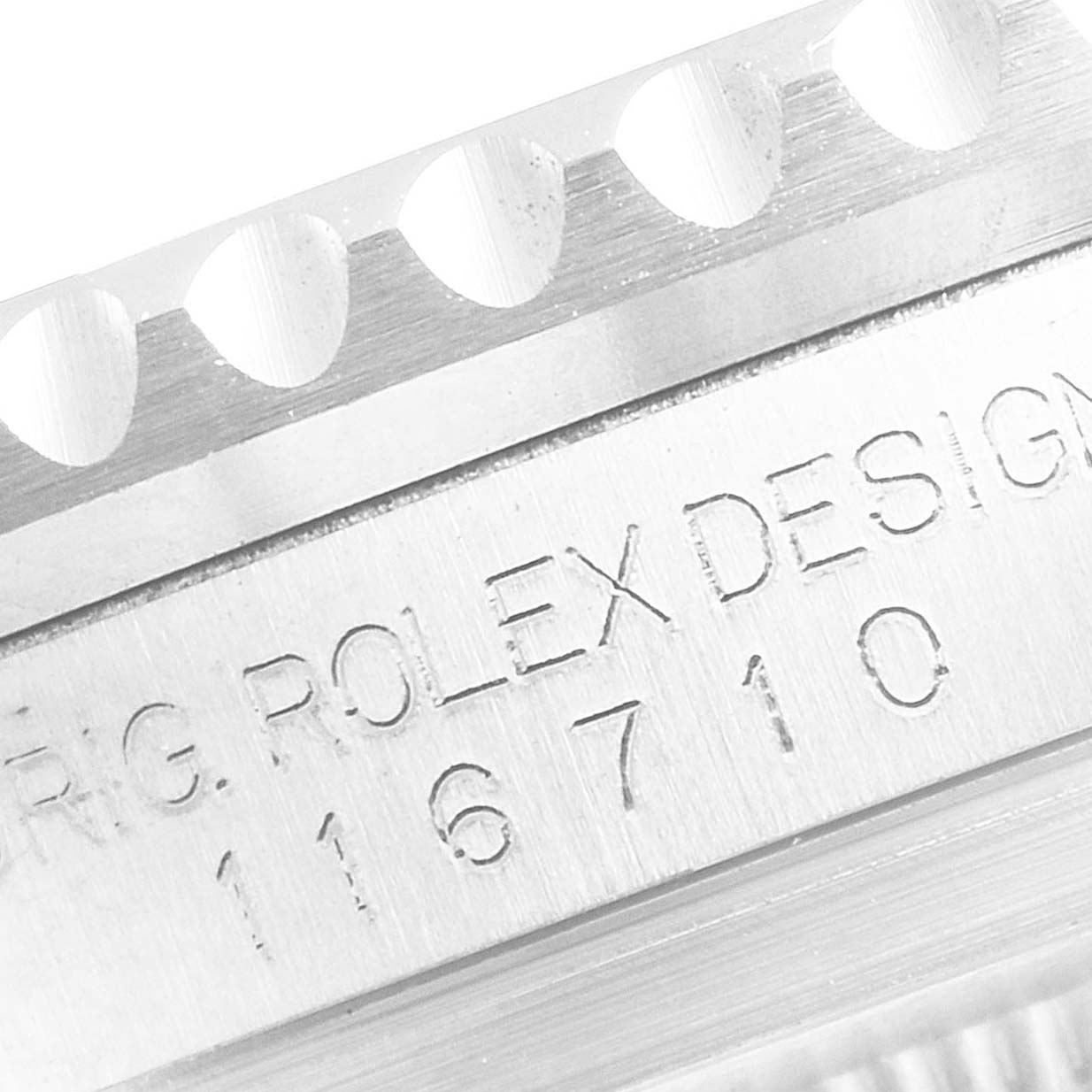 The image shows a close-up of the reference number and the bezel
s edge of a Rolex GMT-Master 116710 Men
s Stainless Steel Black Dial 116710 Men
s Stainless Steel Black Dial watch.