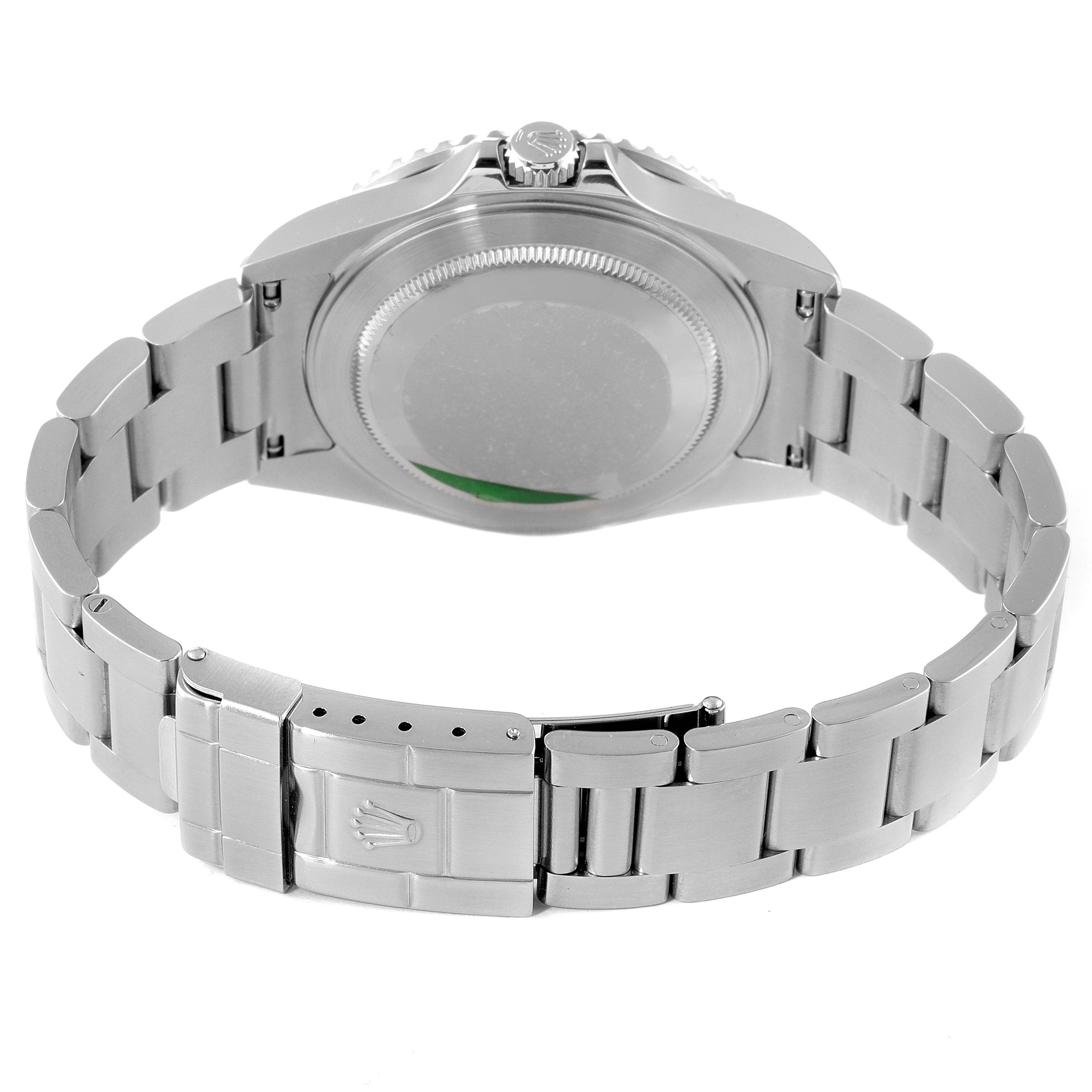 The Rolex GMT-Master 16710 Men
s Stainless Steel Black Dial 16710 Men
s Stainless Steel Black Dial watch is shown from the rear, featuring the case back and the bracelet with the clasp.