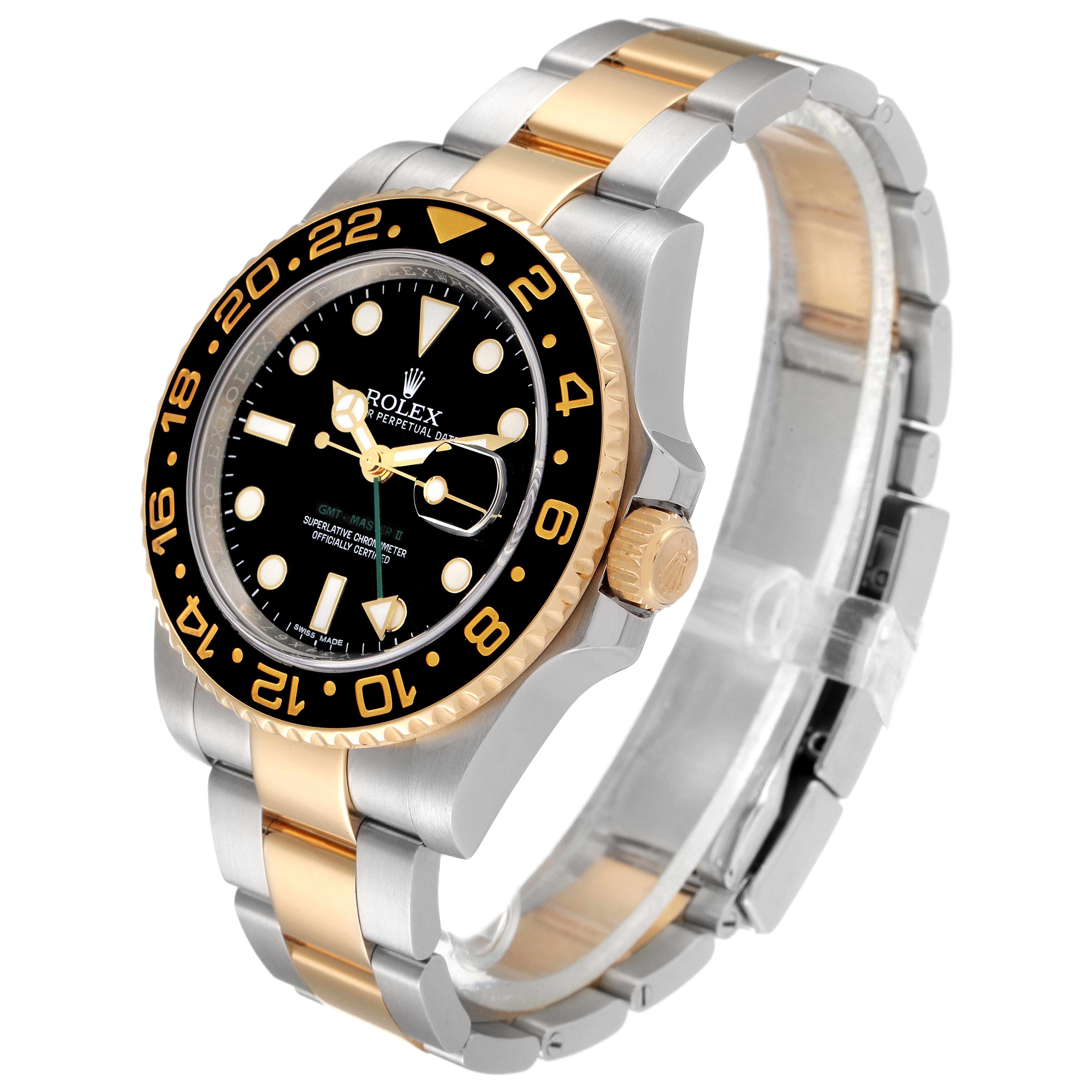 The Rolex GMT-Master 116713 Men's Steel and Gold (two tone) Black Dial 116713 Men's Steel and Gold (two tone) Black Dial watch is shown at a three-quarter angle, highlighting its black dial, two-tone bezel, and bracelet.