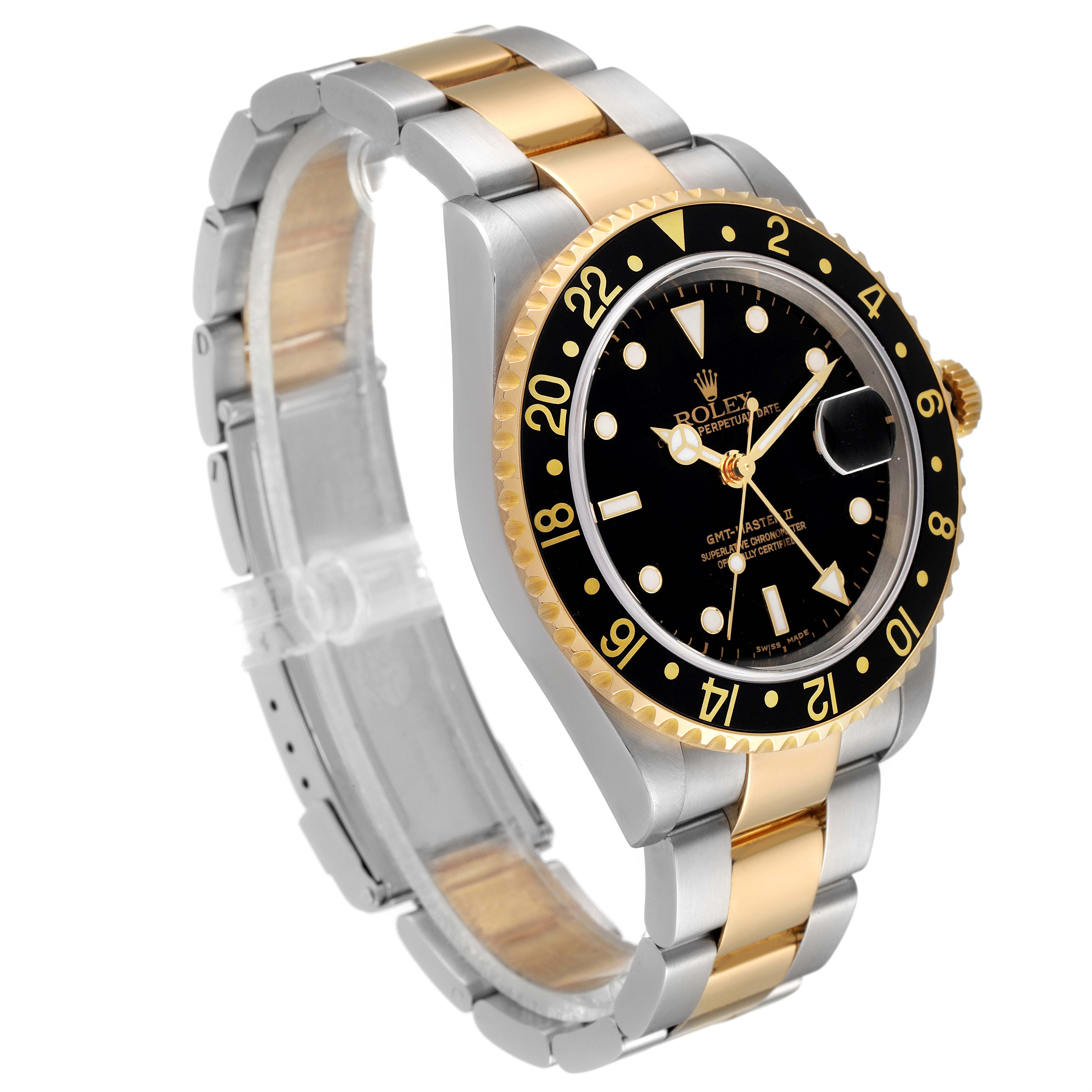 The Rolex GMT-Master 16713 Men's Steel and Gold (two tone) Black Dial 16713 Men's Steel and Gold (two tone) Black Dial watch is shown at an angle highlighting its black dial, black and gold bezel, and two-tone bracelet.