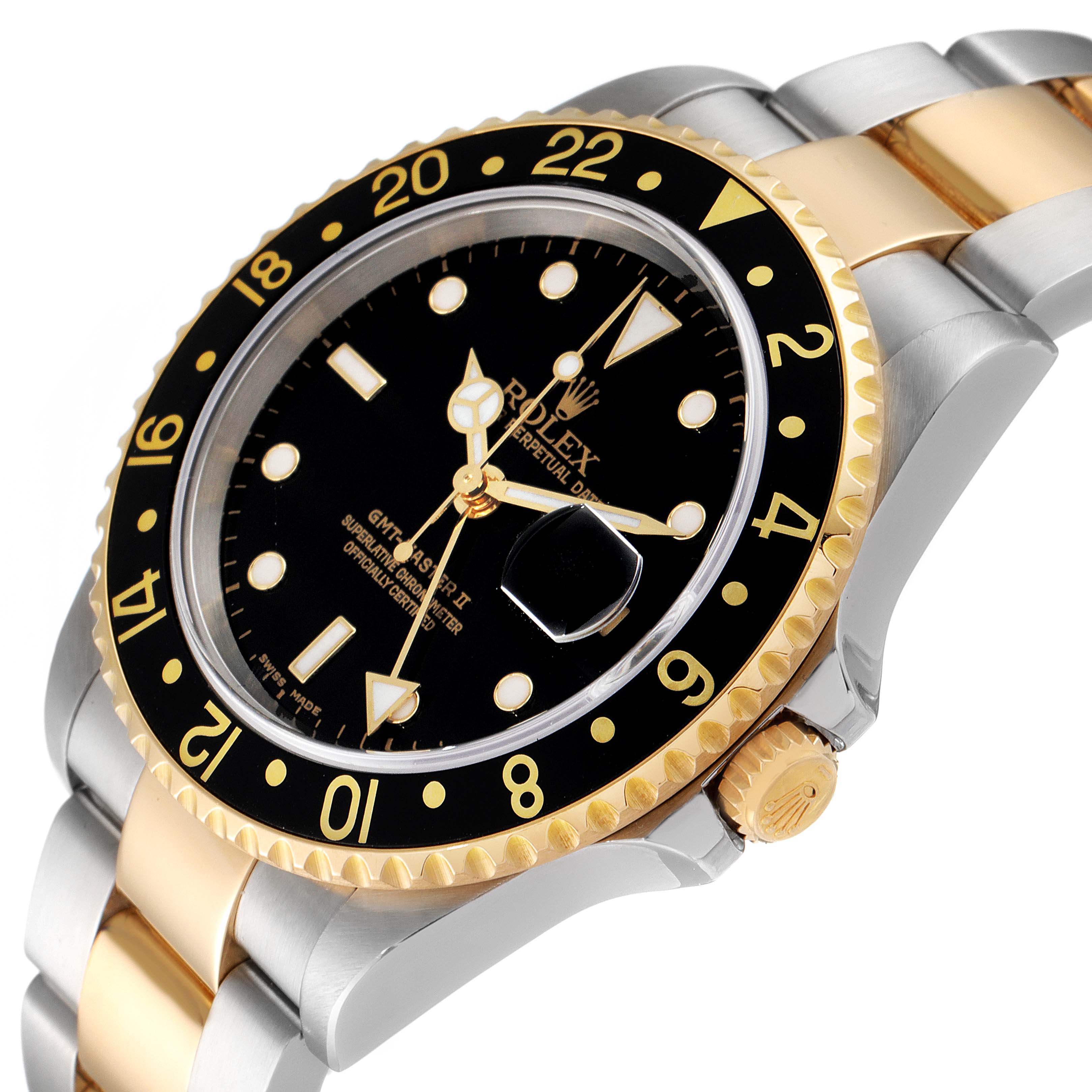 This image shows a Rolex GMT-Master 16713 Men's Steel and Gold (two tone) Black Dial 16713 Men's Steel and Gold (two tone) Black Dial watch at an angled close-up, showcasing the dial, bezel, crown, and part of the bracelet.