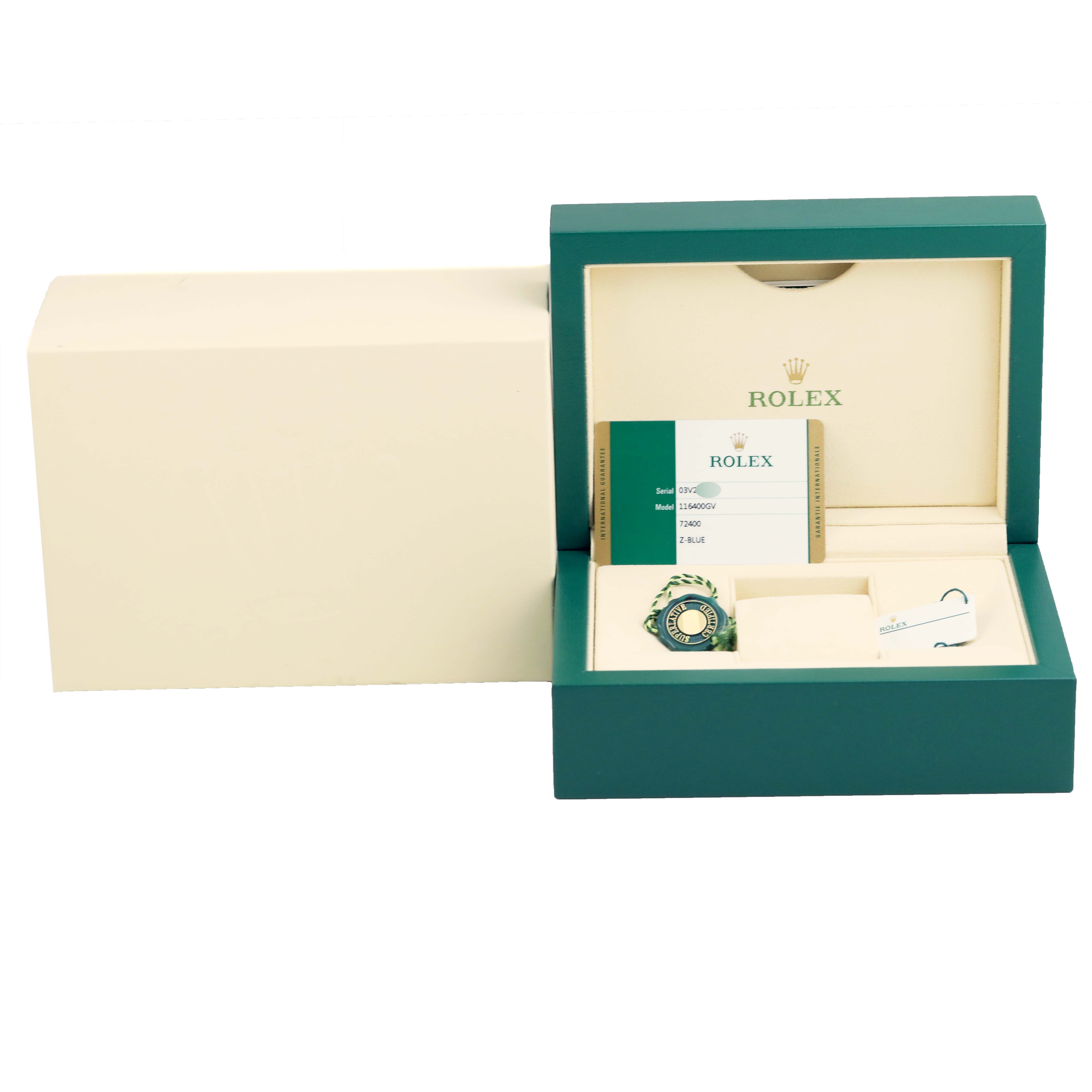 The image shows the packaging, warranty card, and accessories for the Rolex Milgauss 116400GV Men's Stainless Steel Blue Dial 116400GV Men's Stainless Steel Blue Dial model, viewed from the front.