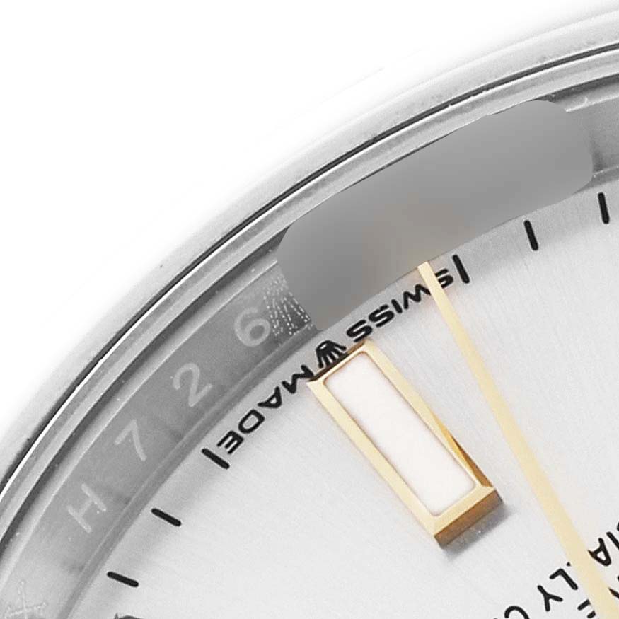This close-up image shows the edge of the dial, the "Swiss Made" label, and the minute and hour markers of the Rolex Oyster Perpetual 124200 Men's Stainless Steel Silver Dial 124200 Men's Stainless Steel Silver Dial watch.