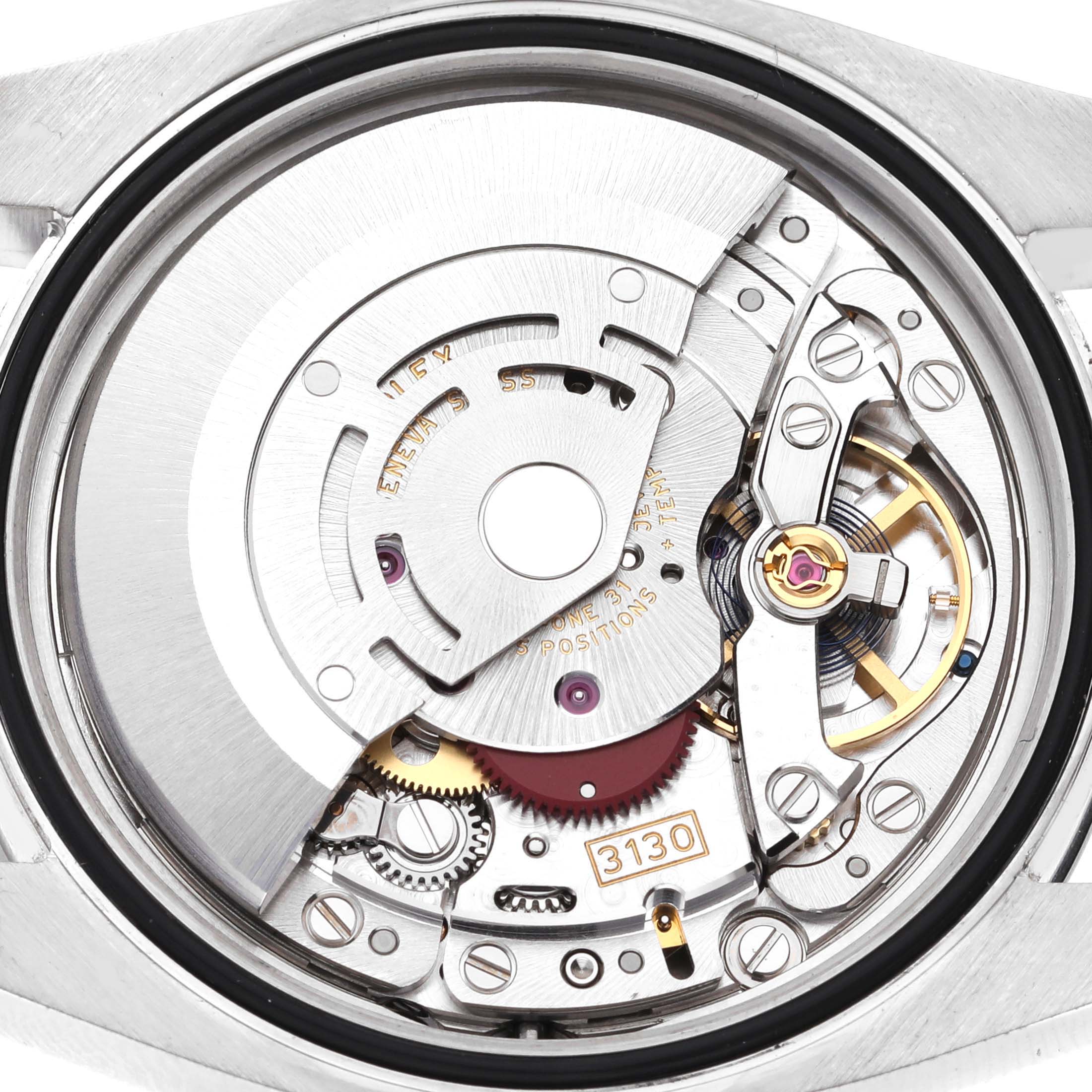 This image shows a close-up view of the movement mechanism inside the Rolex Oyster Perpetual 116000 Men
s Stainless Steel Black Dial 116000 Men
s Stainless Steel Black Dial watch.