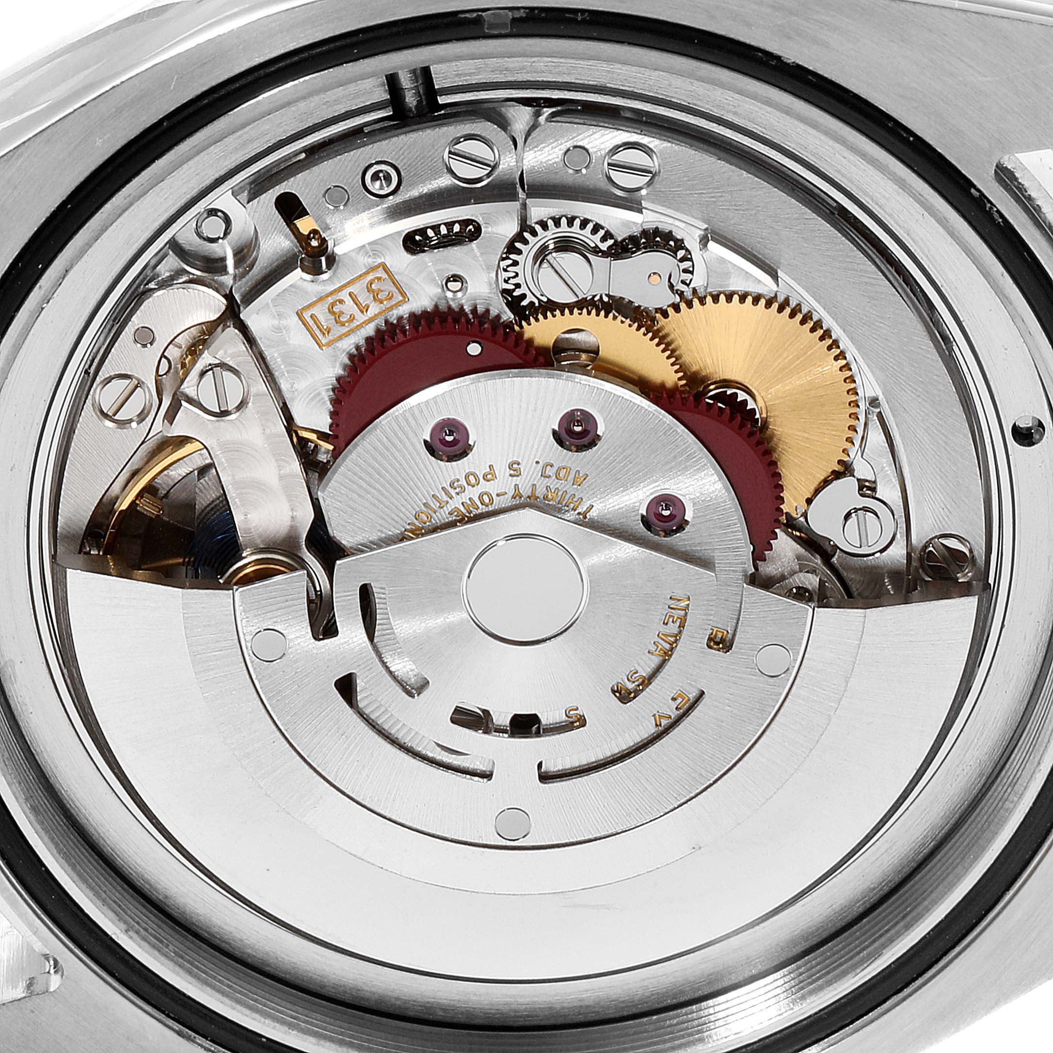 The image shows a close-up view of the intricate movement of the Rolex Air-King 116900 Men's Stainless Steel Black Dial 116900 Men's Stainless Steel Black Dial watch.