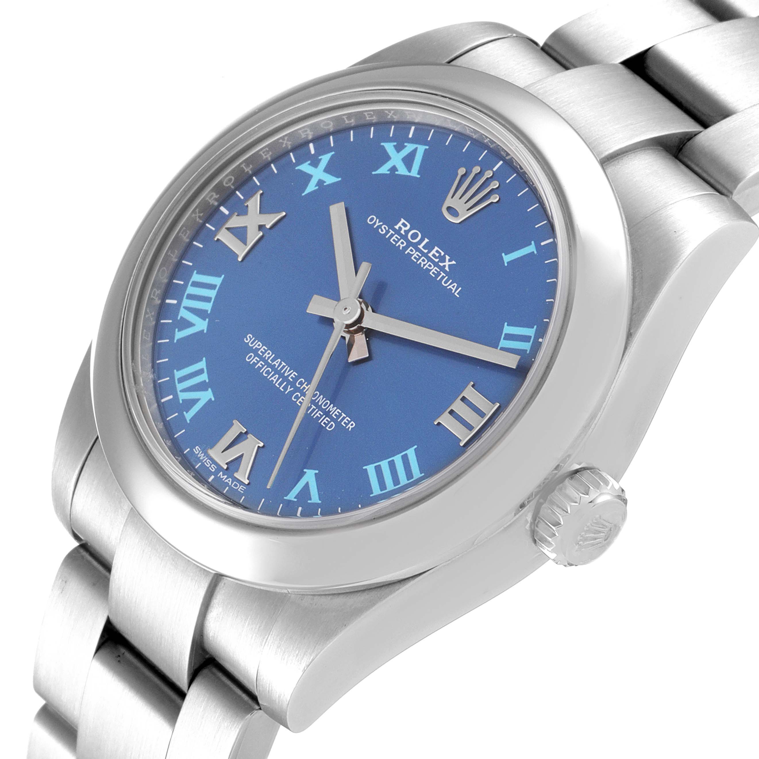 This image shows a Rolex Mid-Size 177200 Women
s Stainless Steel Blue Dial 177200 Women
s Stainless Steel Blue Dial Oyster Perpetual watch at a slight angle, highlighting the blue dial, Roman numerals, and part of the bracelet.
