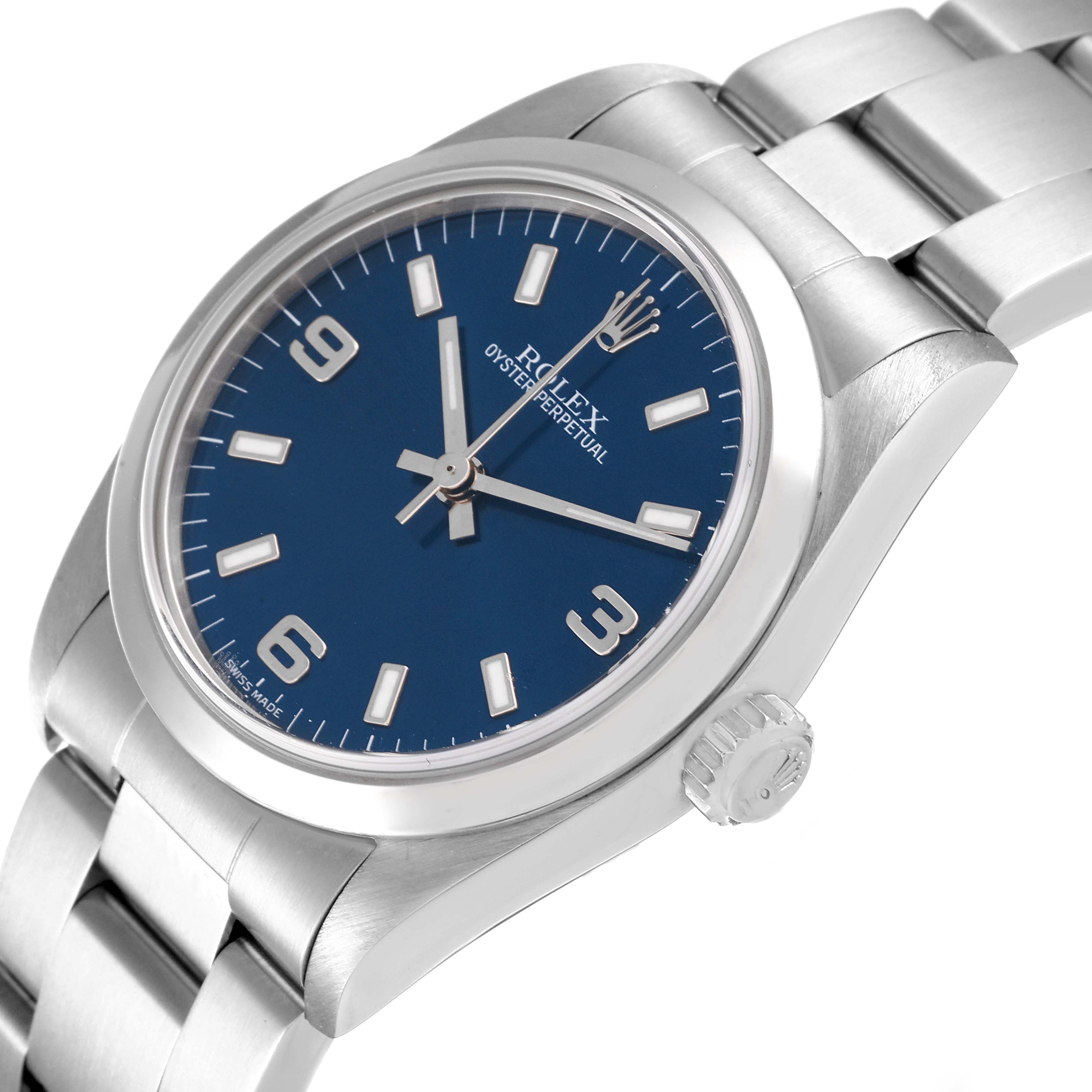 The mid-size Rolex watch is shown at an oblique angle featuring its blue dial, case, crown, and a portion of the bracelet.