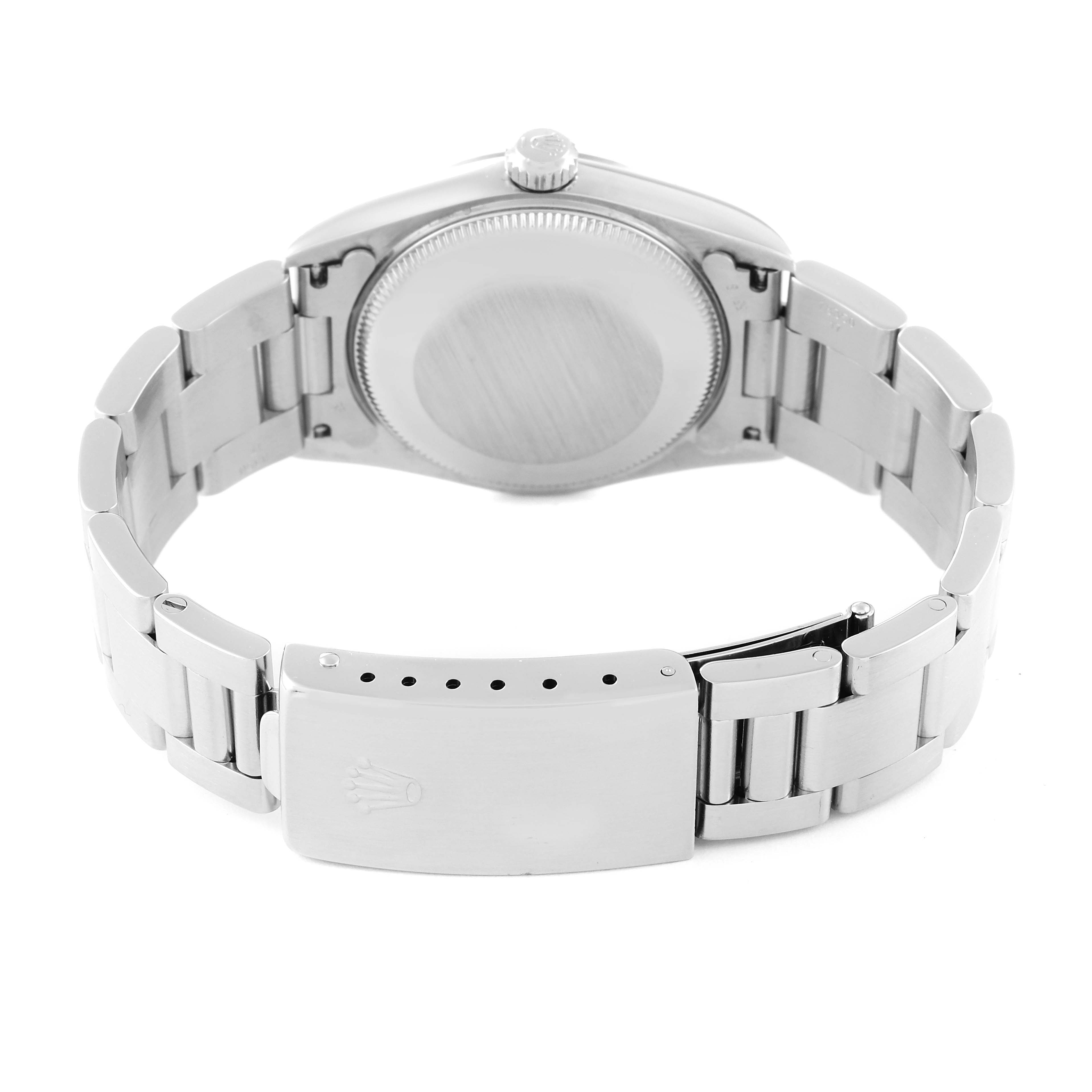 This image shows the back and clasp of a Rolex Mid-Size 77080 Women
s Stainless Steel Blue Dial 77080 Women
s Stainless Steel Blue Dial watch from an angled view.