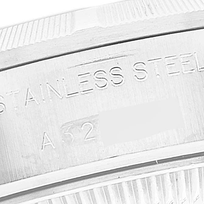 This image shows a close-up of the case back with engraving on a Rolex Date 69190 Women's Stainless Steel Blue Dial 69190 Women's Stainless Steel Blue Dial model watch in stainless steel.